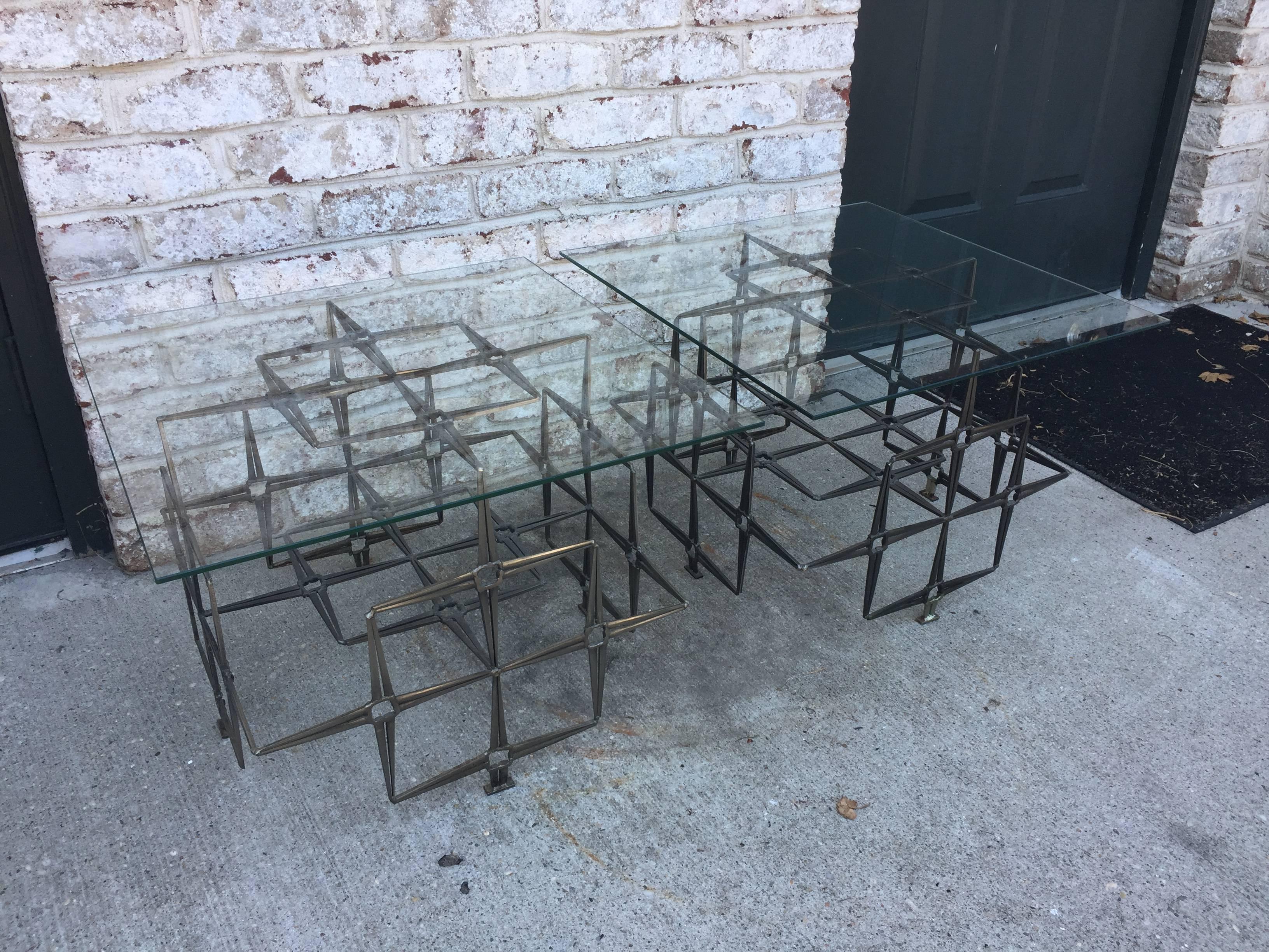 This matching pair of Unique vintage Tri-Mark Brutalist inspired handcrafted coffee tables are constructed of welded steel masonry nails and square glass tops. Dimensions of base alone is 19 x 19 inches.

Keyword: Paul Evans, Curtis Jere.
 