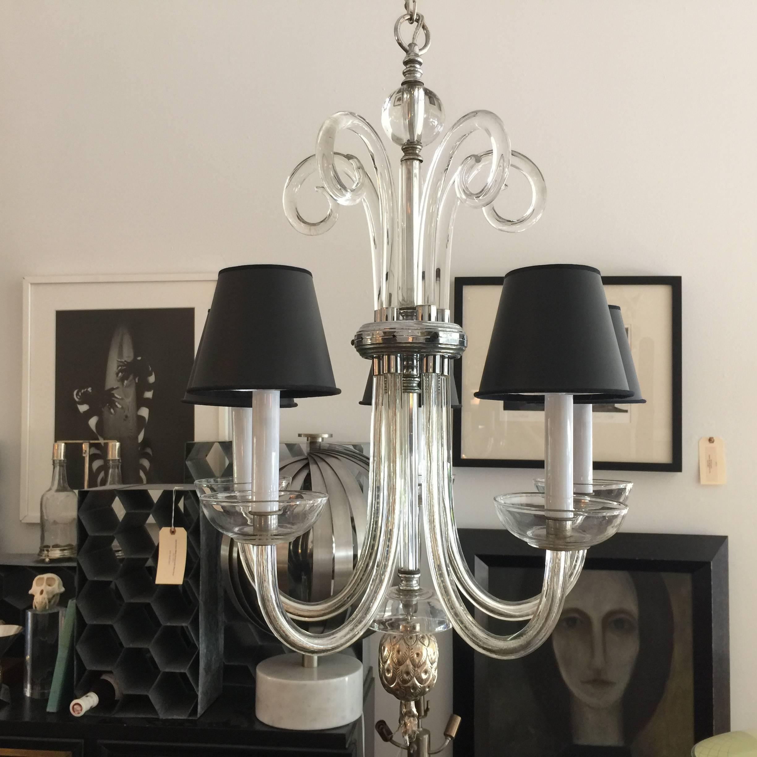 Hand blown crystal chandelier with lovely details; pineapple in sterling silver finial and central ring.  Five arms and curled finials.  It is like a piece of jewelry!

NOTE:  shades shown here are NOT INCLUDED.