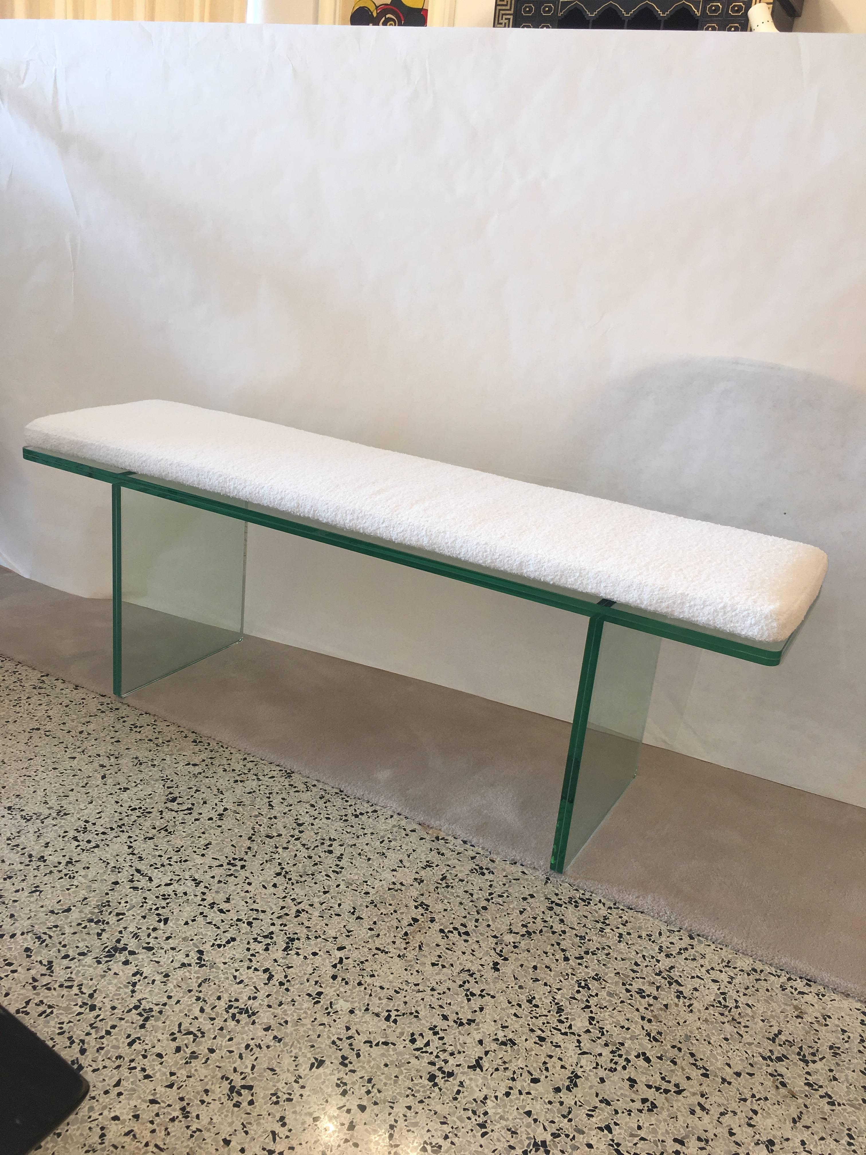 Made from high-impact glass in green tone with a tightly woven chenille cushion (velcro attached). Measure: Glass is 3/4 inch thick.

This is a minimal design bench, perfect for end of the bed or foyer/gallery.