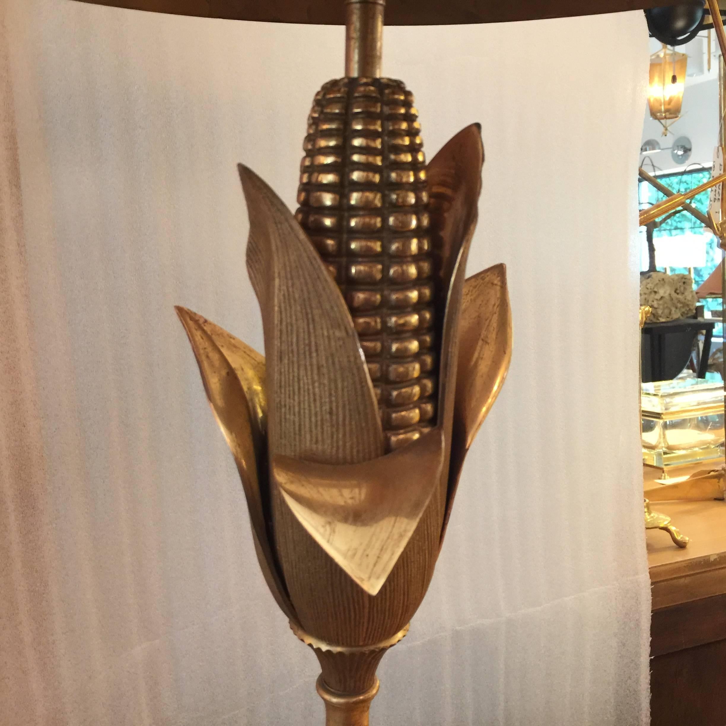 Classic corn motif by Maison Charles et Fils with original brass shade and finial. Rewired with silk cord.

The corn, a symbol of growth, was used as a metaphor for France's post war resurgence. (Post Art Deco/modern neoclassical).