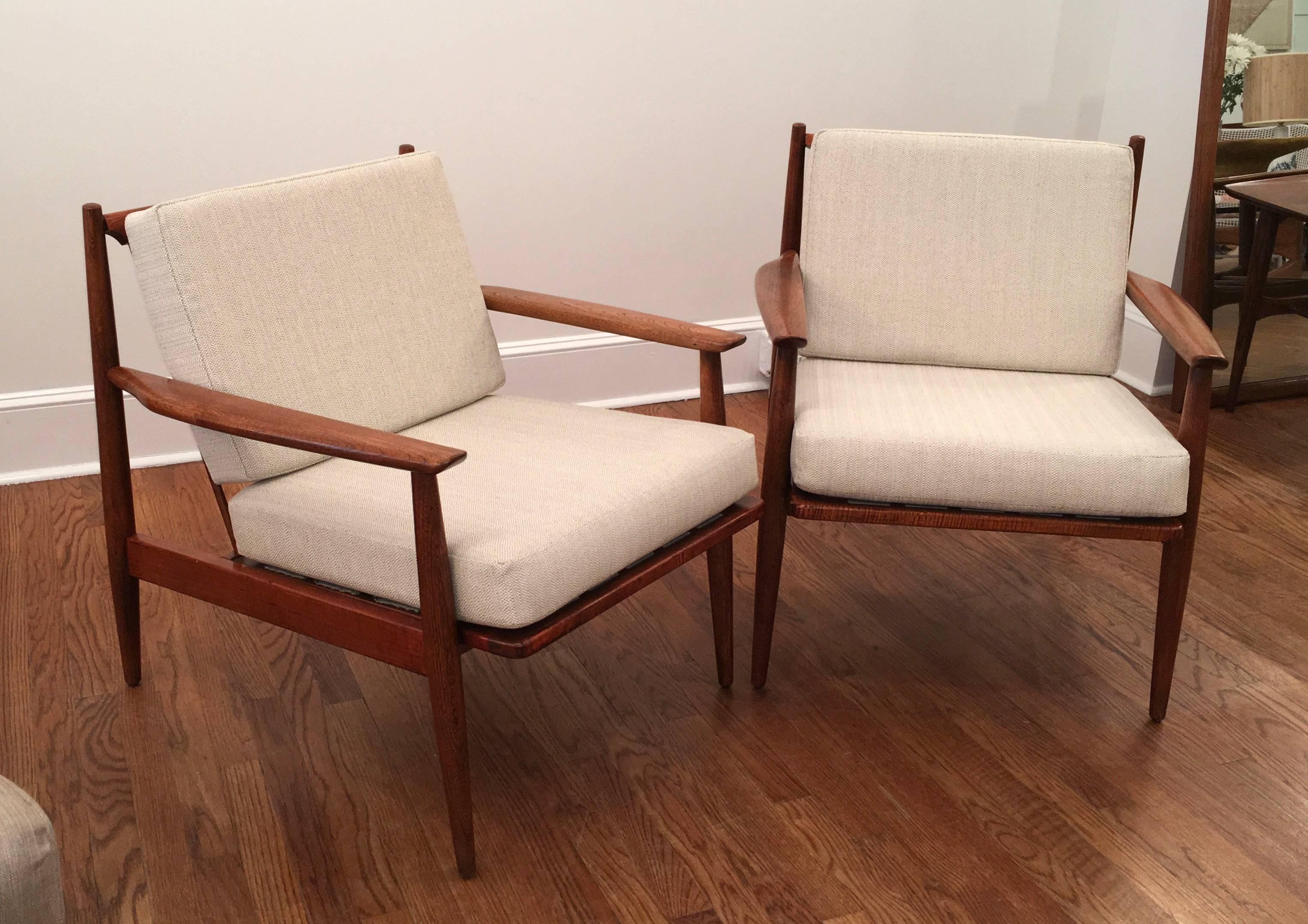 Two walnut armchairs by Baumeister. Recently refinished. New cushions. Deep, comfortable seats newly upholstered.