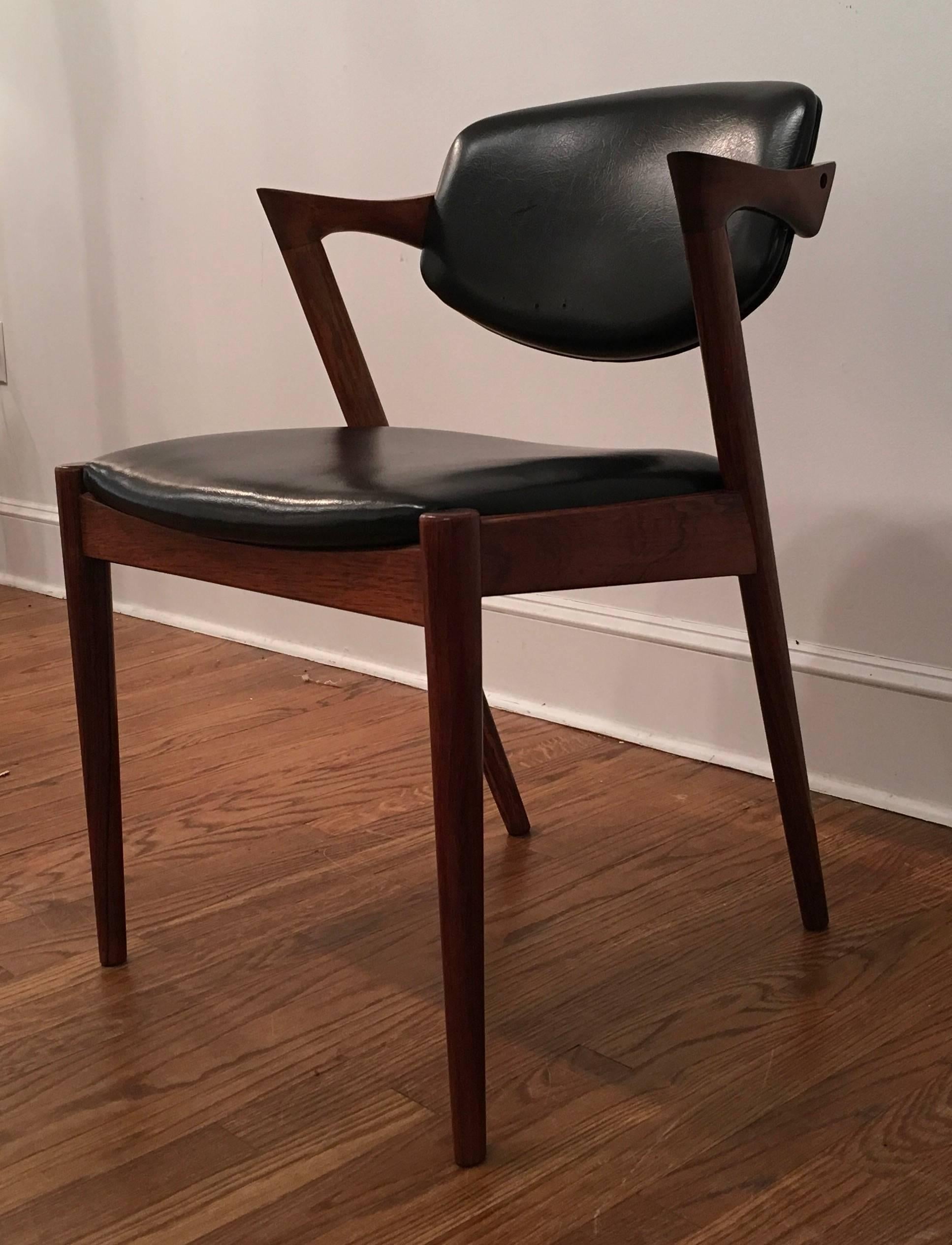 Rosewood chair by Kai Kristiansen. Made in Denmark, 1950's. The chair has a swivel back and adjusts angle for comfort. Perfect as a desk chair or as an occasional chair. Chair has been recently refinished.
