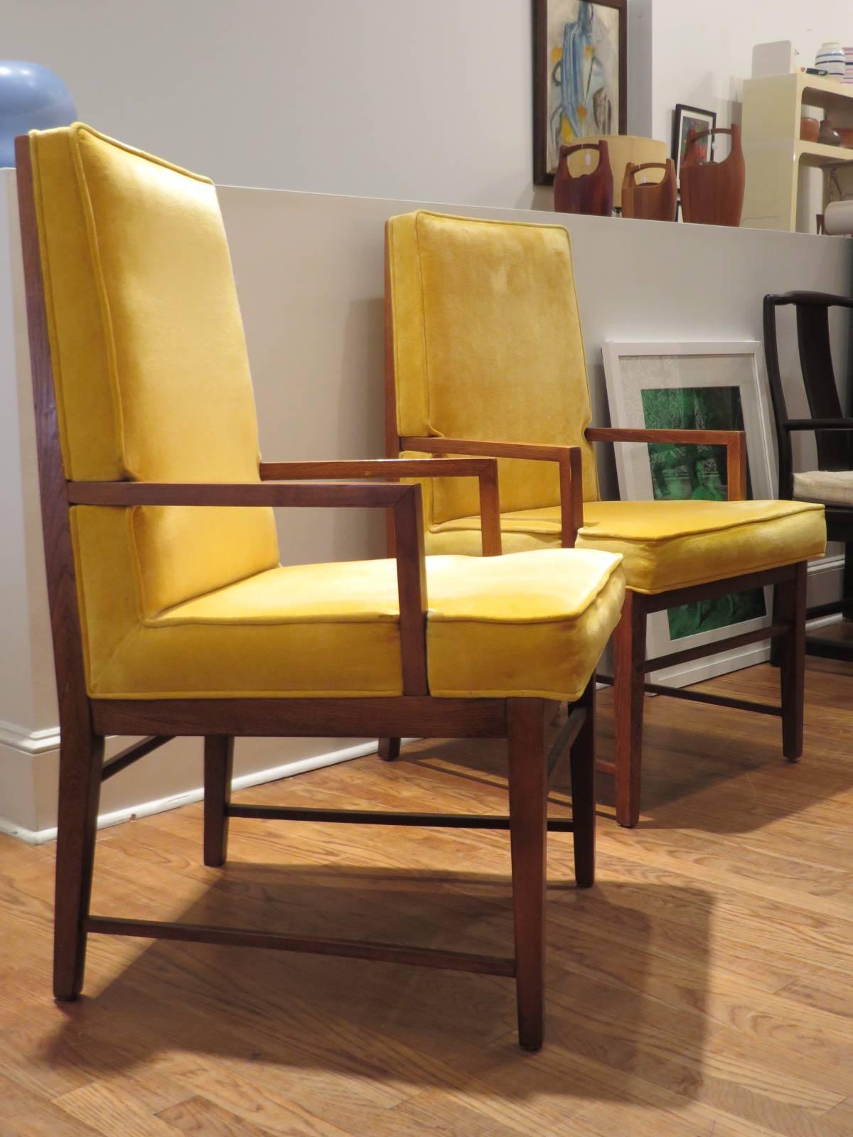 Pair of very comfortable high back chairs by Kipp Stuart. The structure of those chairs is in very good condition , the condition of its upholstery is  appropriate  for their age