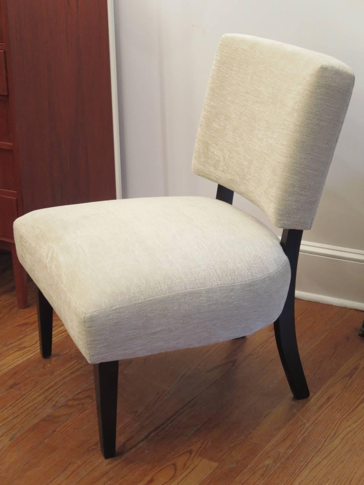 This chair, recently reupholstered in chenille-velvet fabric, very elegant, is in perfect condition.