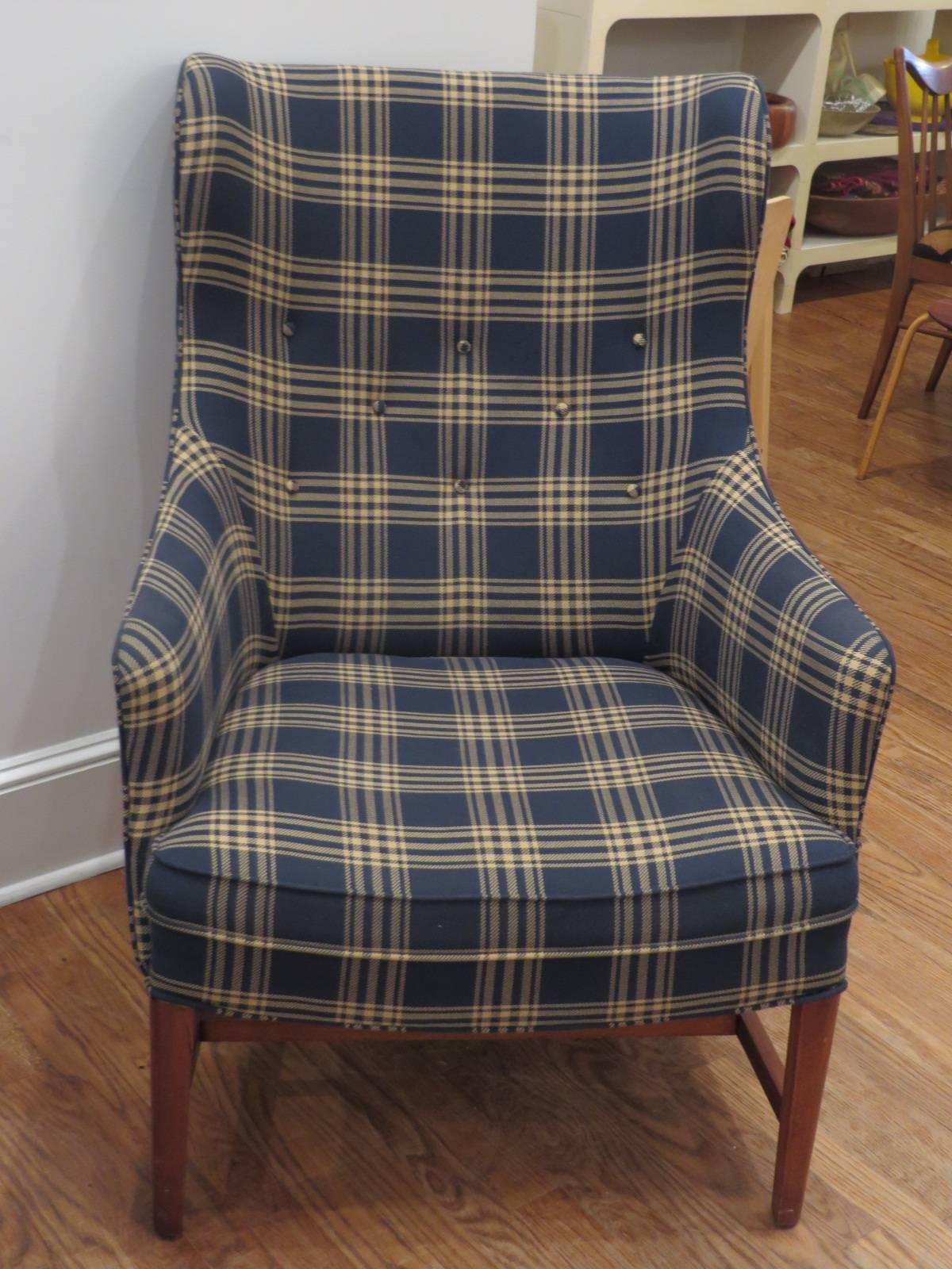 Comfortable wing chair in vintage Schumacher plaid. Looks great and would be perfect in any room. Great reading or relaxing chair.