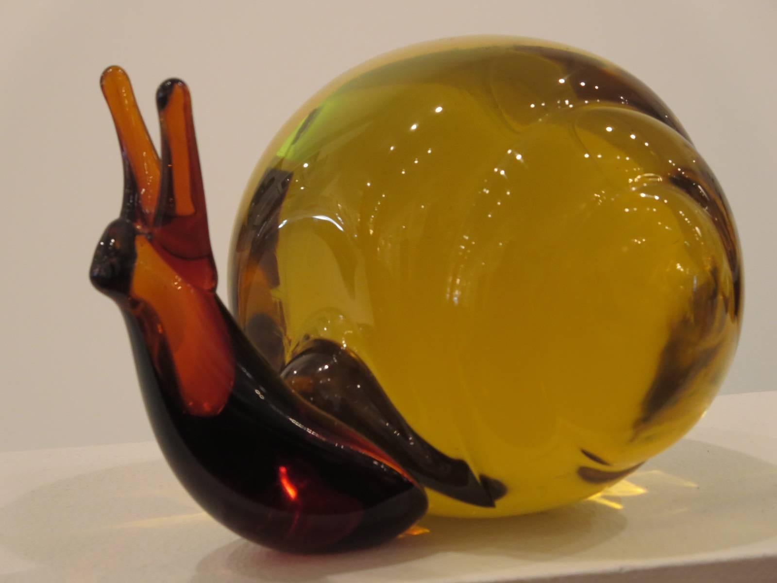 Lovely Murano two colors amber glass snail by Salviati.
