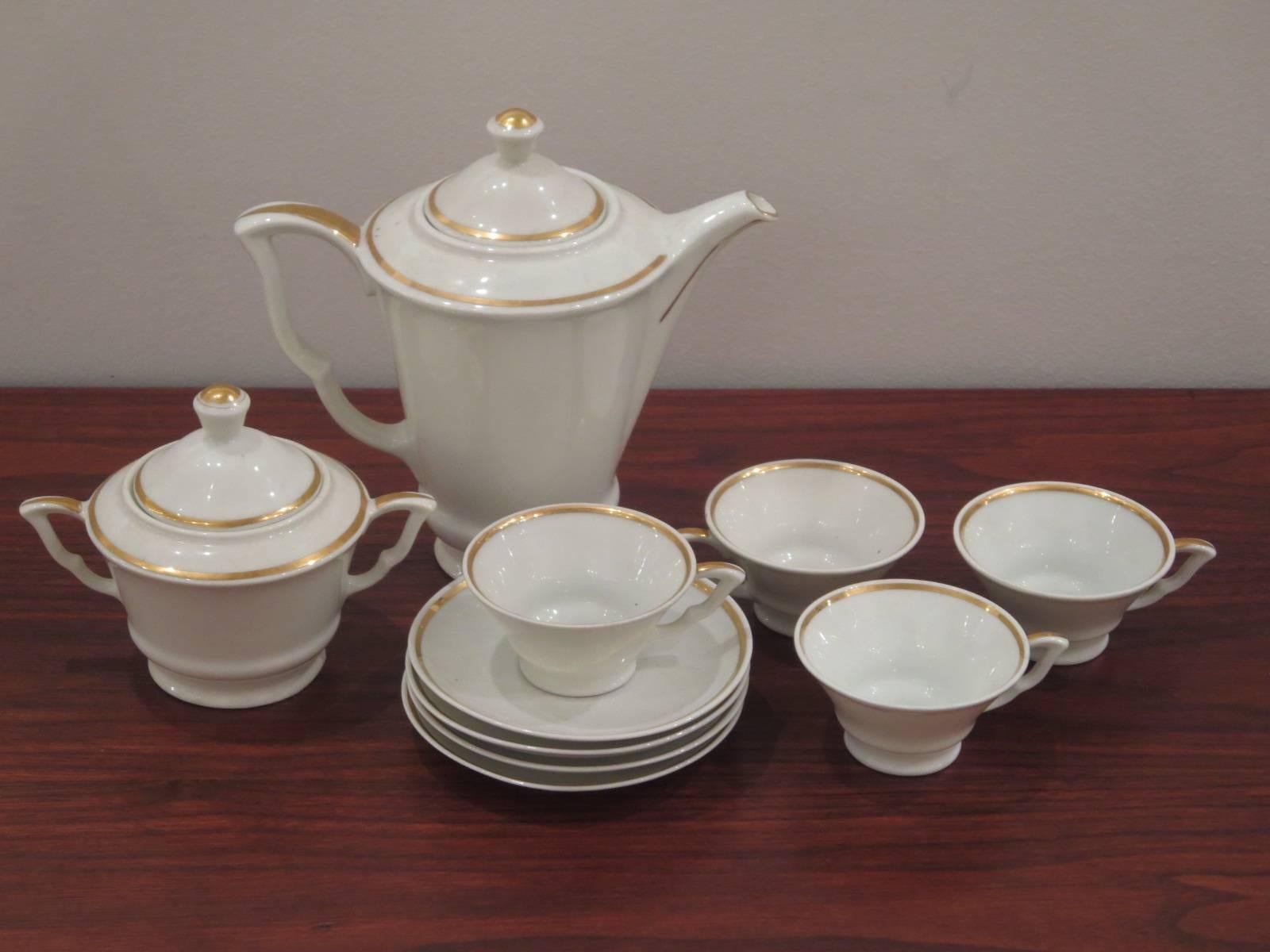Espresso coffee set for four: Four cups and saucers, coffee pot and sugar bowl in excellent vintage condition.
Coffee pot:7 H x 7 W x 4.5 D.
Sugar bowl: 5 H x 4 W x 3.5 D.
