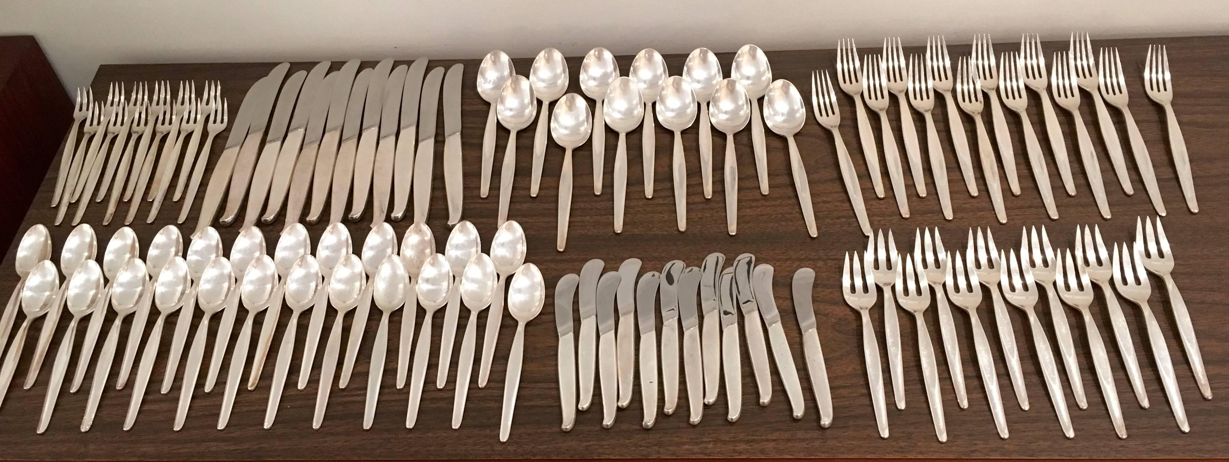 98 piece sterling silver flatware service designed by Robert J King, student of John Prip. This set includes:

12 knives, 8 3/4