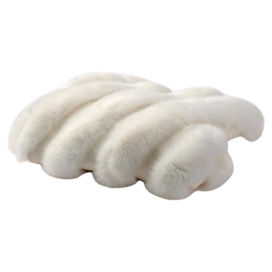 The bed runner made of pure wool and Fox fur adds style to the room, lighting it up with its natural brightness. 
The alternation of fox fur with wool creates a raised pattern that decorates the bed and provides a soft seat.

This throw blanket will