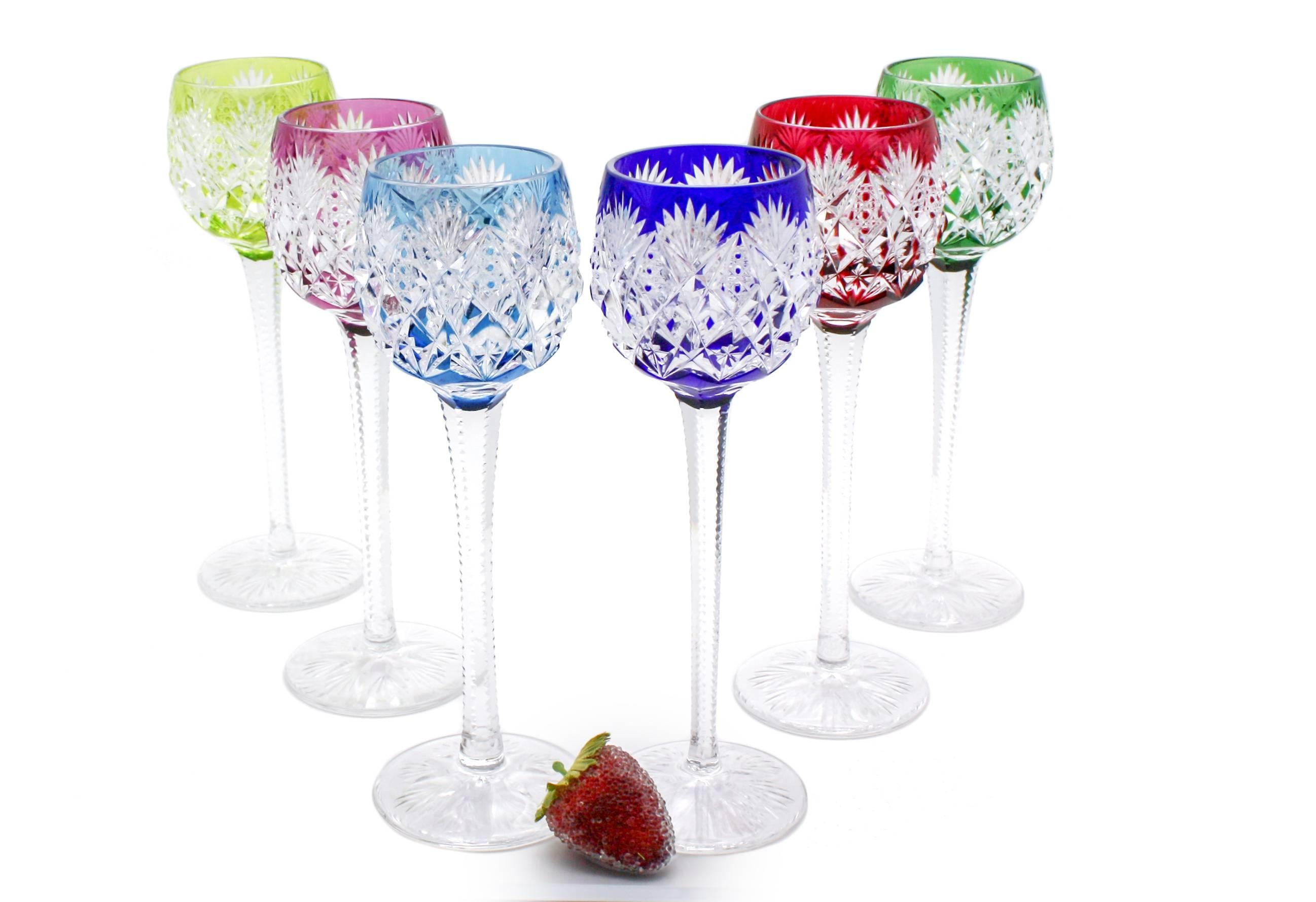 This rare set of 12 St. Louis handblown goblets is comprised of six sets of two each in a range of vibrant jewel-tone colors. Standing 9 1/2
