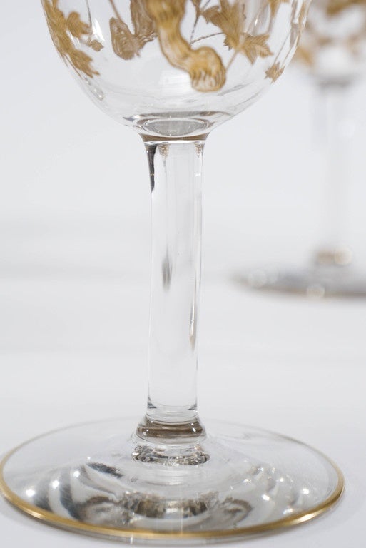 12 Baccarat Crystal Wine Goblets Intaglio Cut with Gilded Exotic Bird Motifs In Excellent Condition In Great Barrington, MA