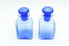 Pair of French Blue Optic Swirl Steuben Dresser Set