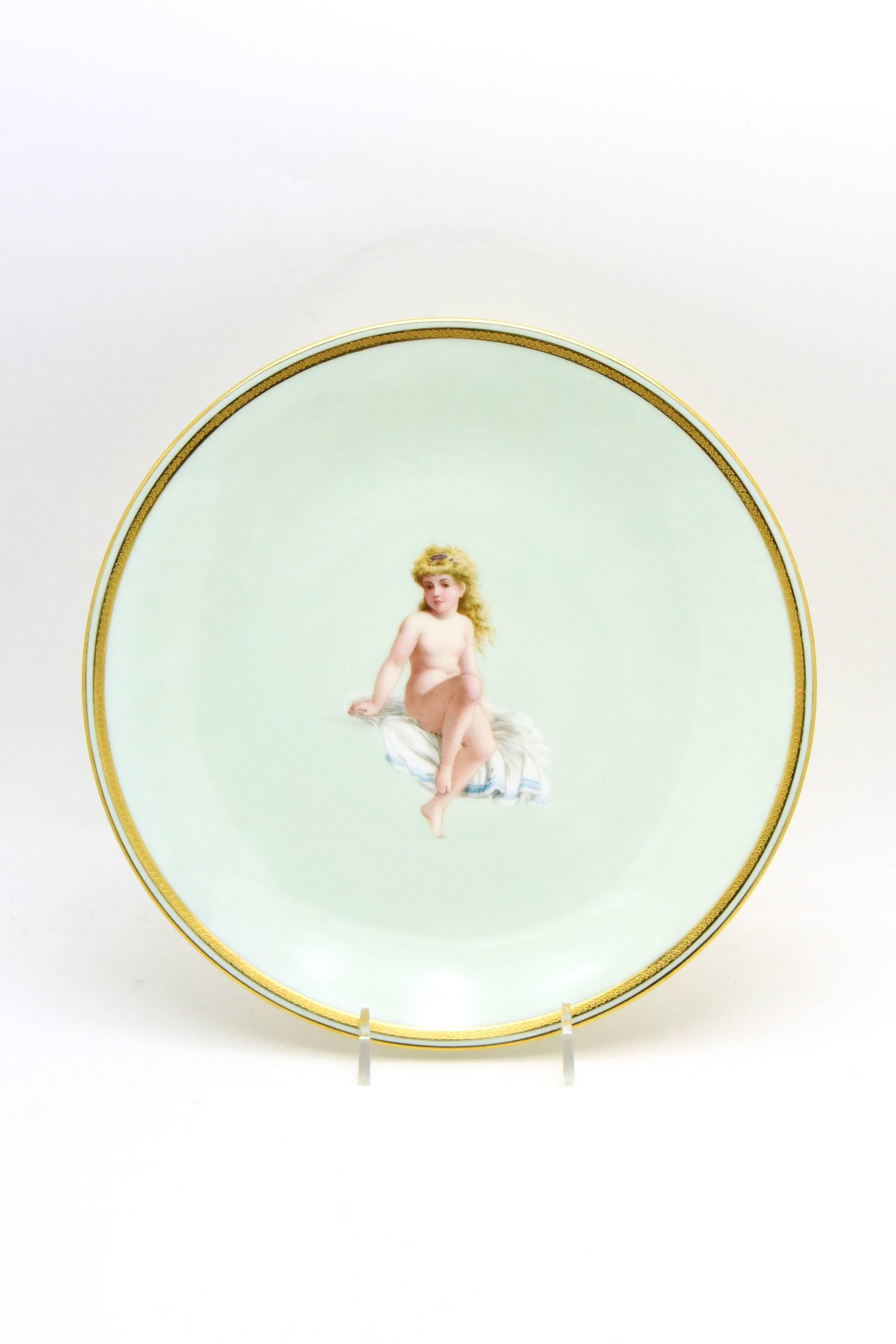 This amazing set of nine Mintons, 19th century cabinet plates depicting young nymphs in fanciful, bucolic settings are beautifully and realistically painted on a soft aqua background framed by a simple acid-etched border. Each uniquely painted