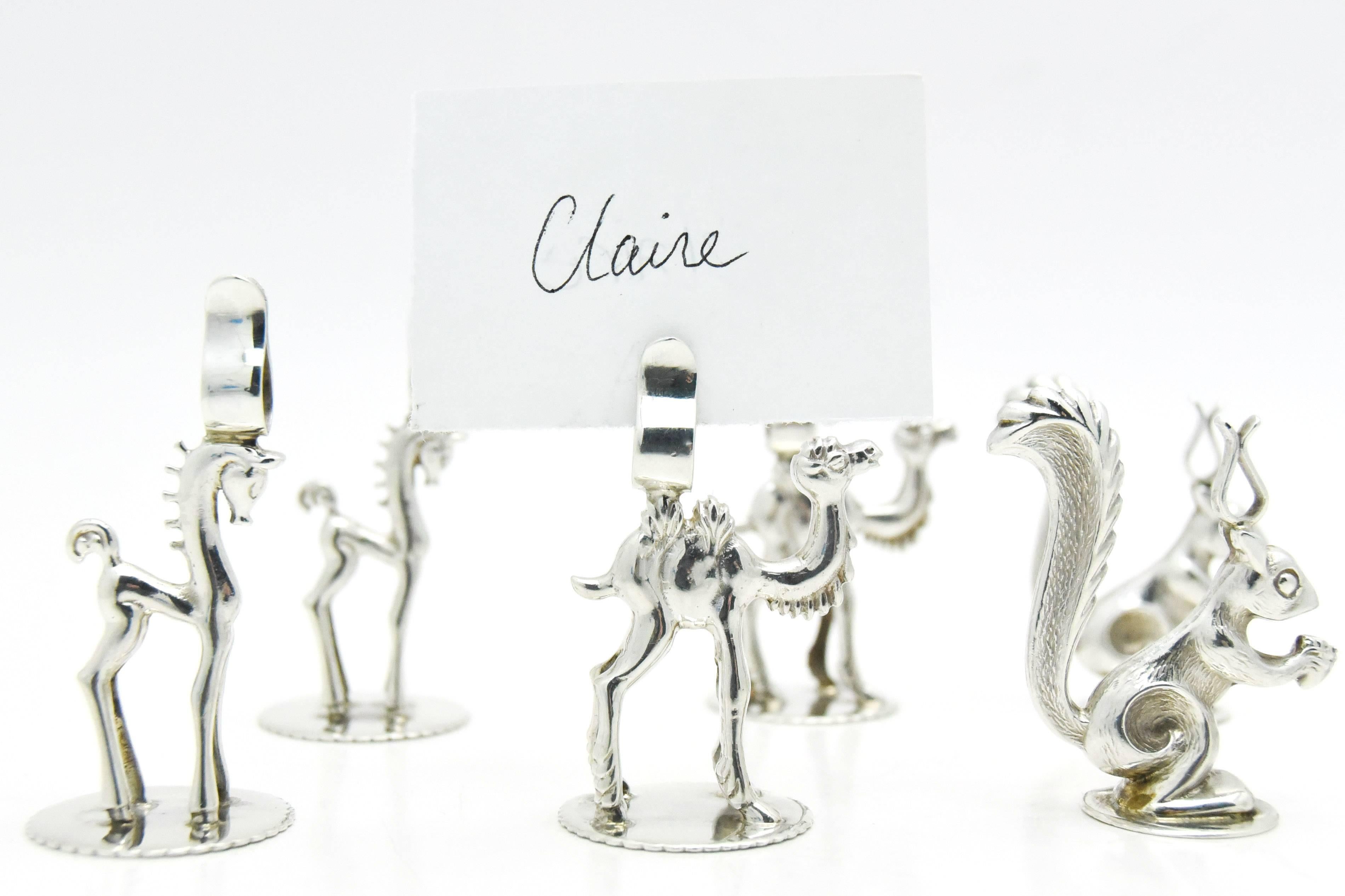 These are sure to put a smile on your face! This set of 12 whimsical sterling silver place card holders are created in the Art Deco style and of the period. Featuring a broad range of animals across the kingdom; elephants, monkeys, squirrels, camels