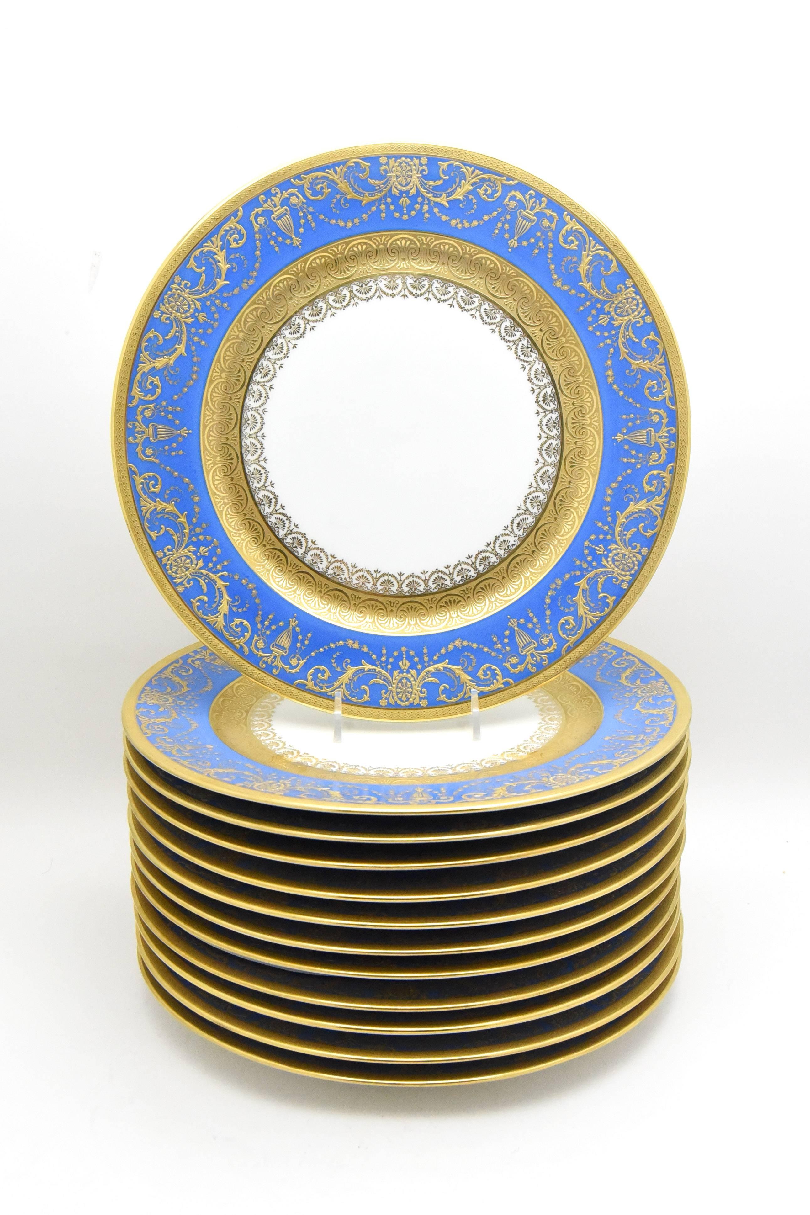 An unusual color and large size makes these 12 Limoges for J. E. Caldwell, plates a great addition to your tablescape. The periwinkle blue border adds a bright contrast to many palettes including, white and gold, floral motifs and pink, to create a