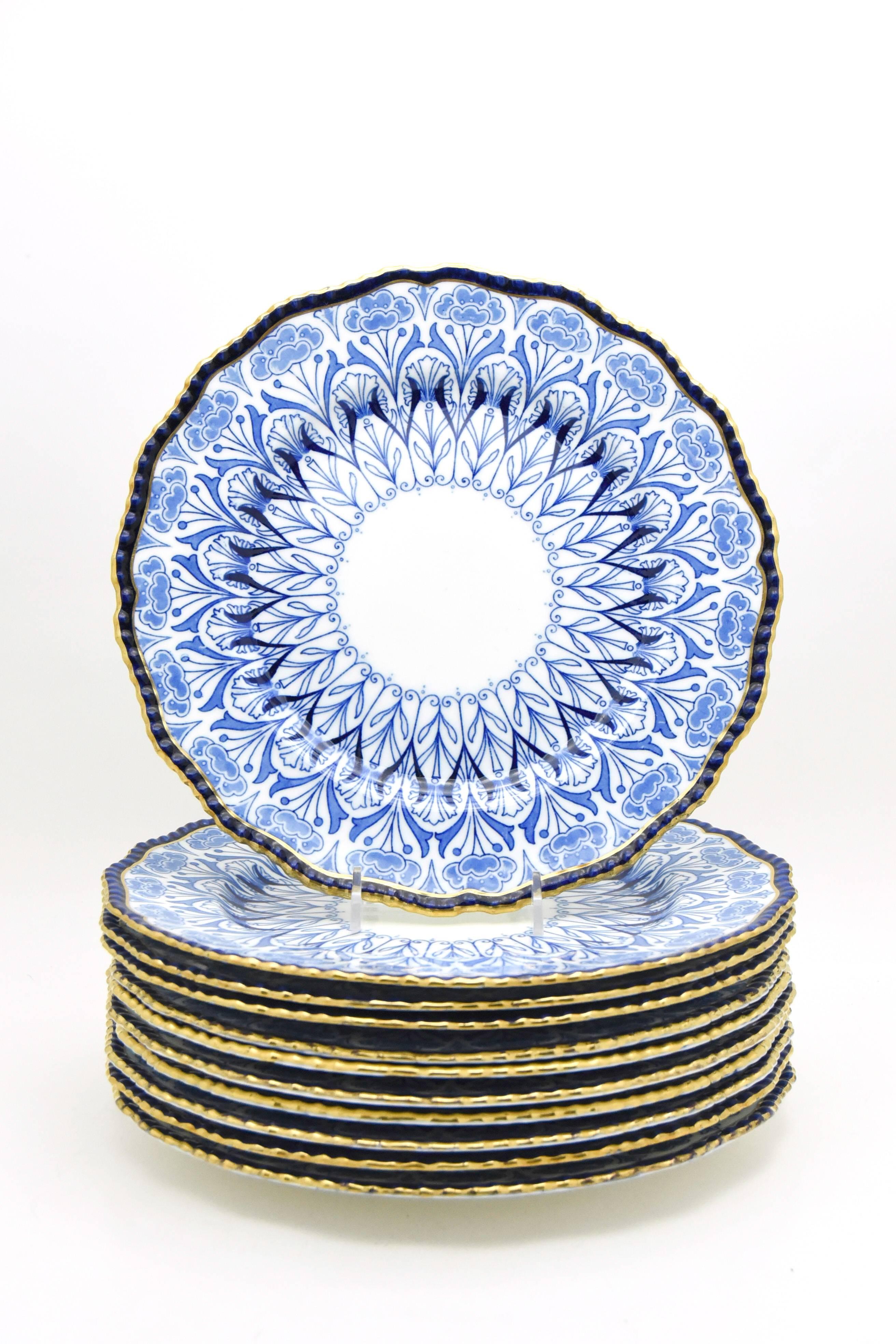 This set of 11 dinner plates, made by Doulton Burslem, exemplify the overlapping decorative styles of the Aesthetic Movement and the Arts and Crafts Movement. They exhibit all the qualities of blue and white Japonesque transfer decoration combined