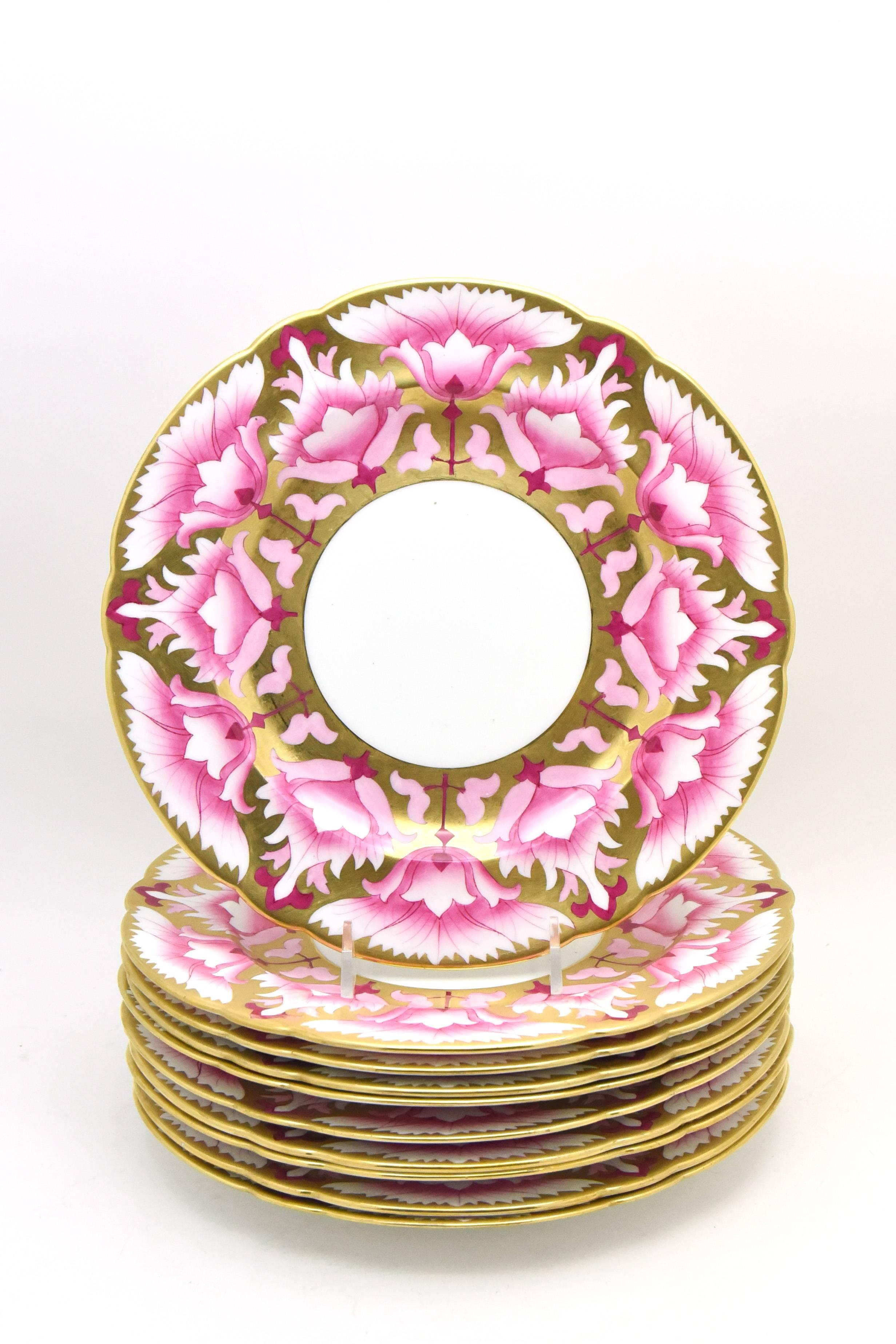 This is a set of ten Foley China, England dessert plates with an unusual and distinctive Arts and Crafts pattern that takes your breath away. The striking combination of colors in contrasting pinks, creates a dramatic statement and the addition of