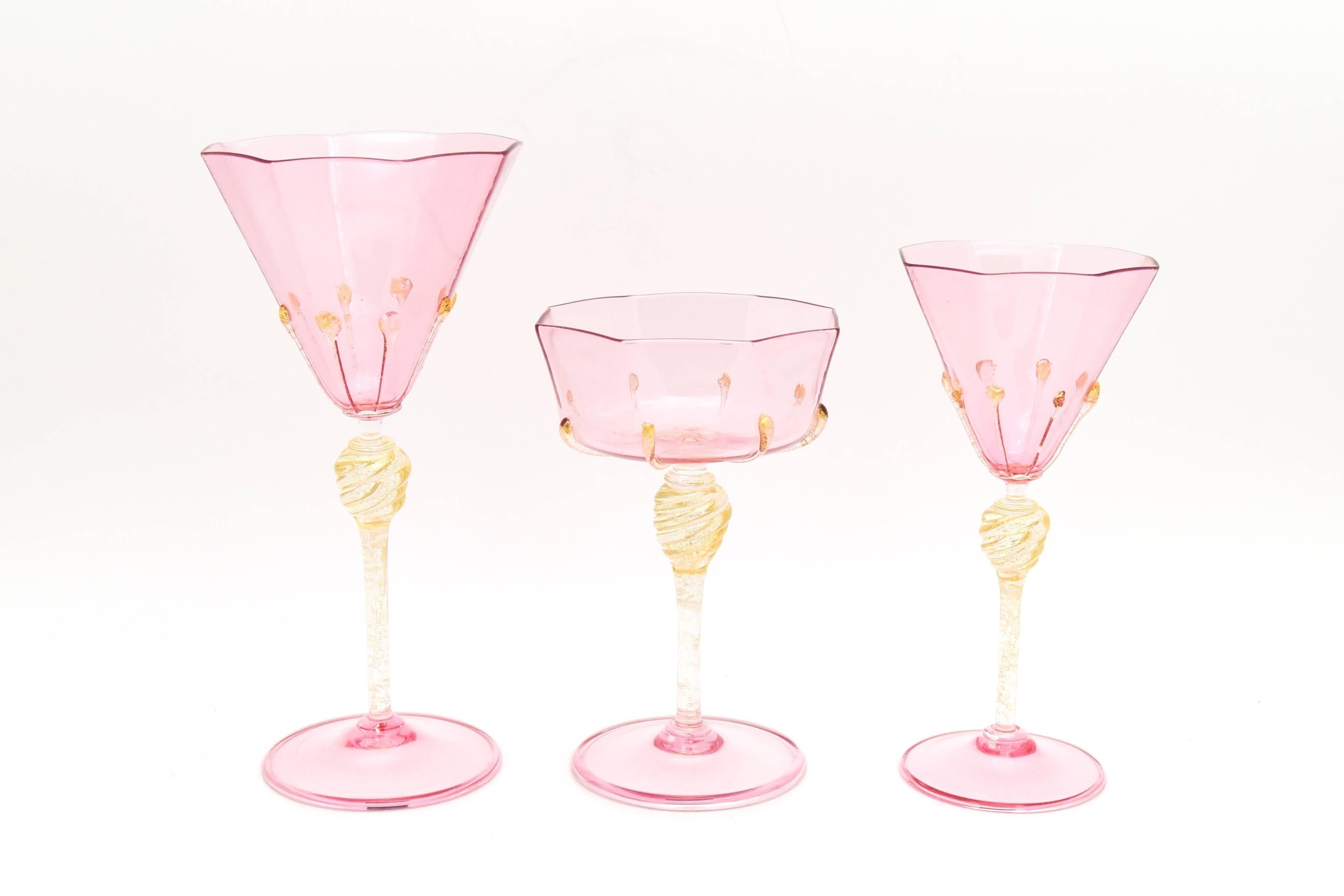 New to my inventory is this outstanding and complete custom-ordered table service of handblown, vibrant pink stemware, made by Salviati, circa 1940s. This set includes 3 sizes of goblets (waters, wines and champagnes), dessert bowls and matching