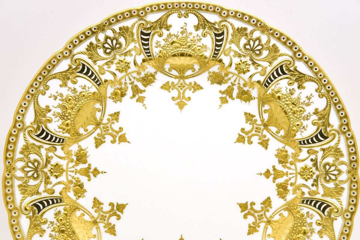 12 Royal Crown Derby Neoclassical Dinner Plates with Profuse Raised Paste Gold  In Good Condition For Sale In Great Barrington, MA