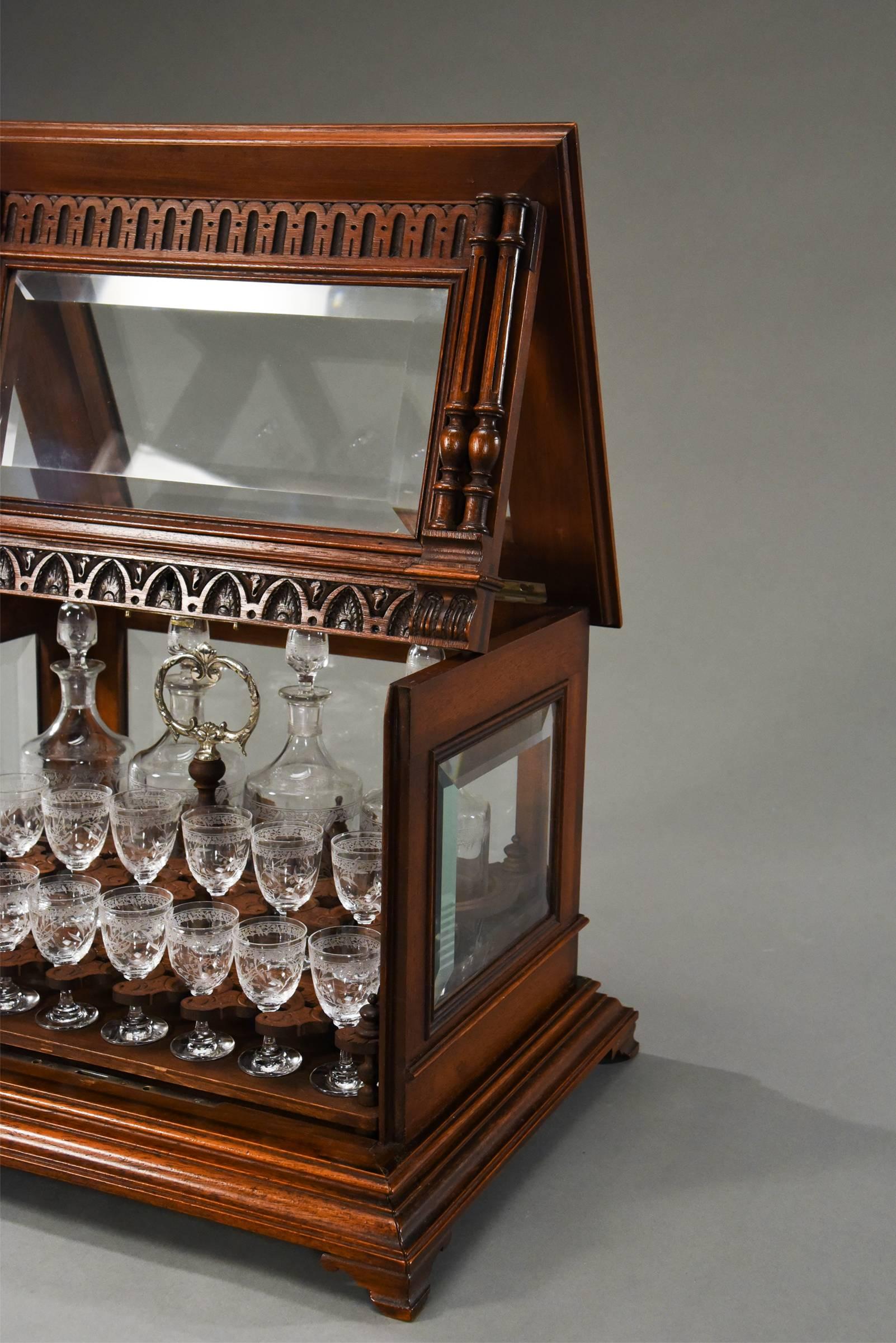 Exceptional Baccarat Cave à Liqueurs with Original Labels in Carved Oak Case In Excellent Condition In Great Barrington, MA