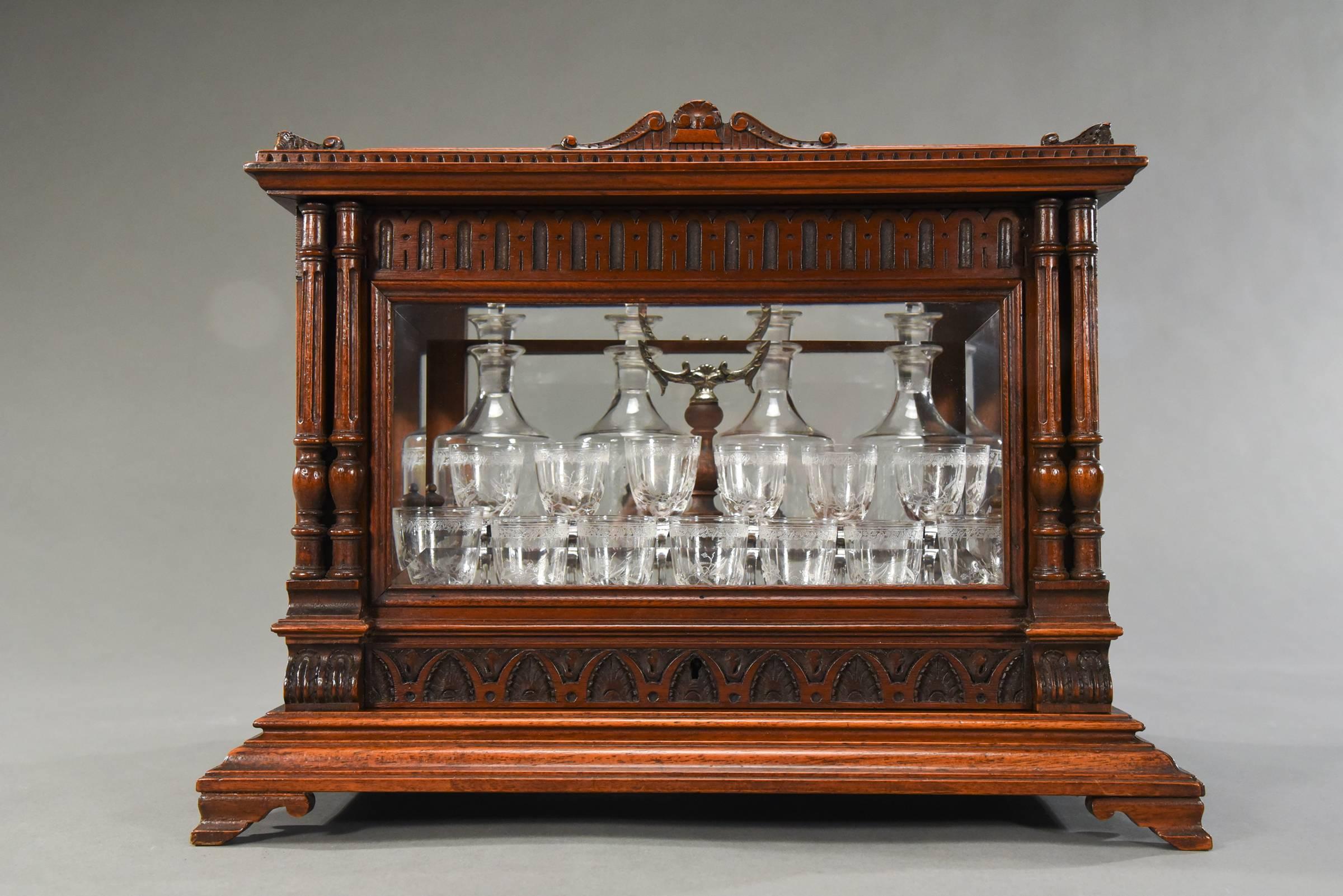 20th Century Exceptional Baccarat Cave à Liqueurs with Original Labels in Carved Oak Case