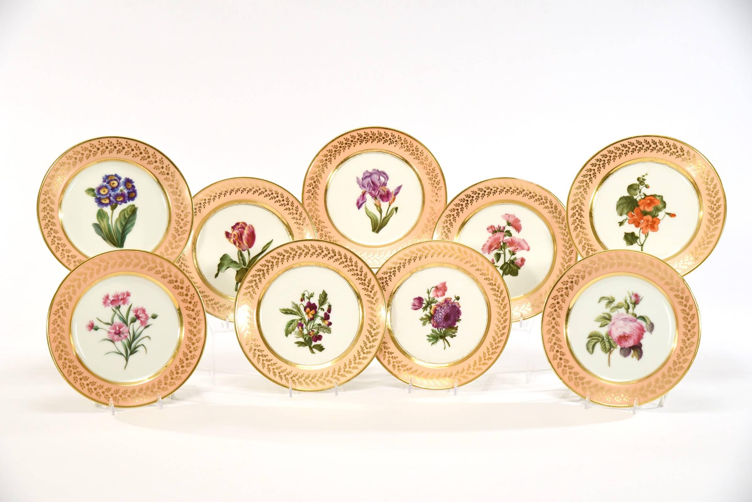 Simple and elegant, this set of Ancienne Maison Dagoty, Edourd Honore, botanical plates and serving pieces showcase the beauty and precision of the hand-painted flower specimens. These would make a stunning display with unique subjects framed by