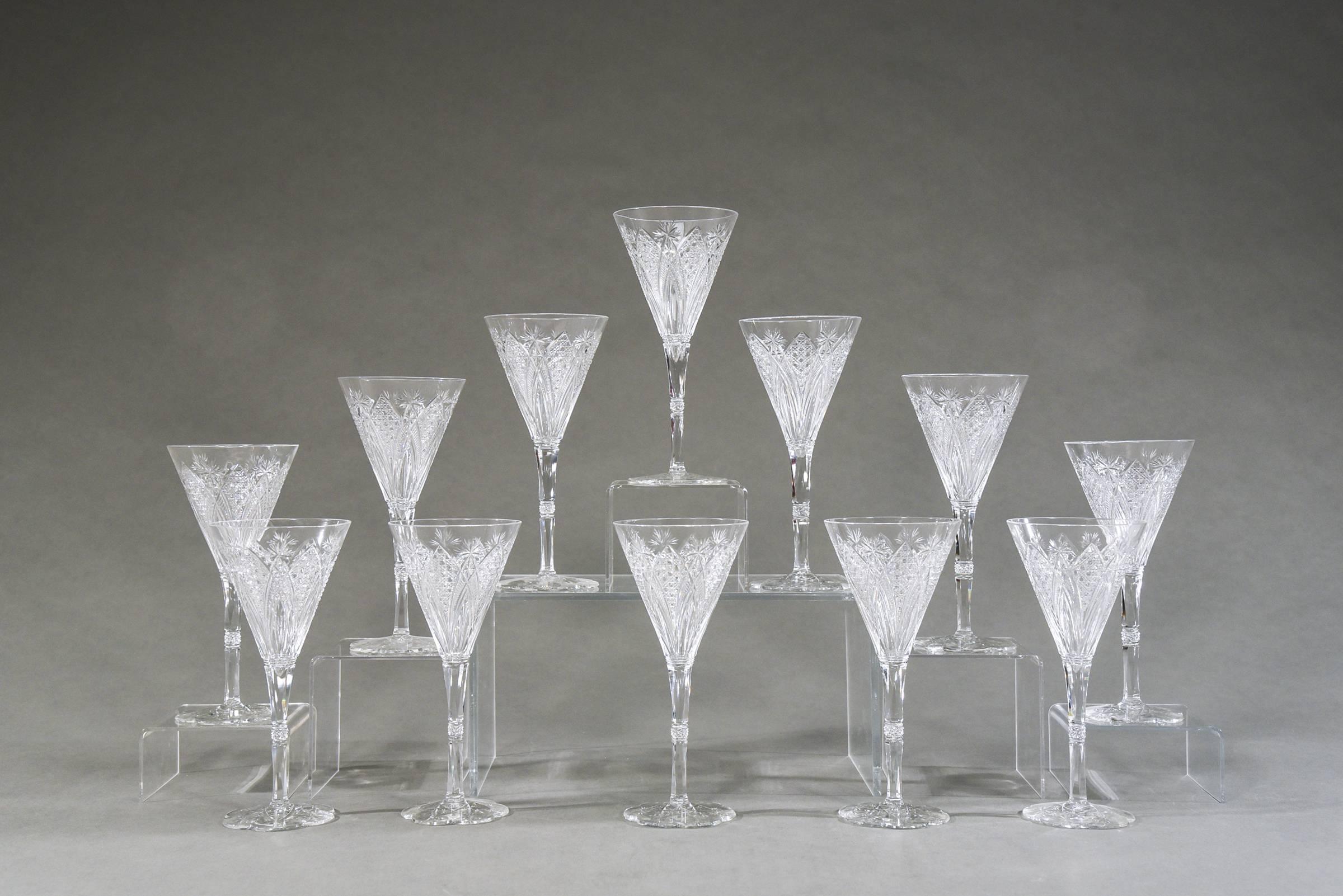 This is an amazing set of 12 signed Baccarat water goblets in the rare Elbeuf pattern. The service was first introduced in 1908 and presented at the International Exhibition in Nancy, France in 1909. Specially ordered in 1920 by the Maharaja of