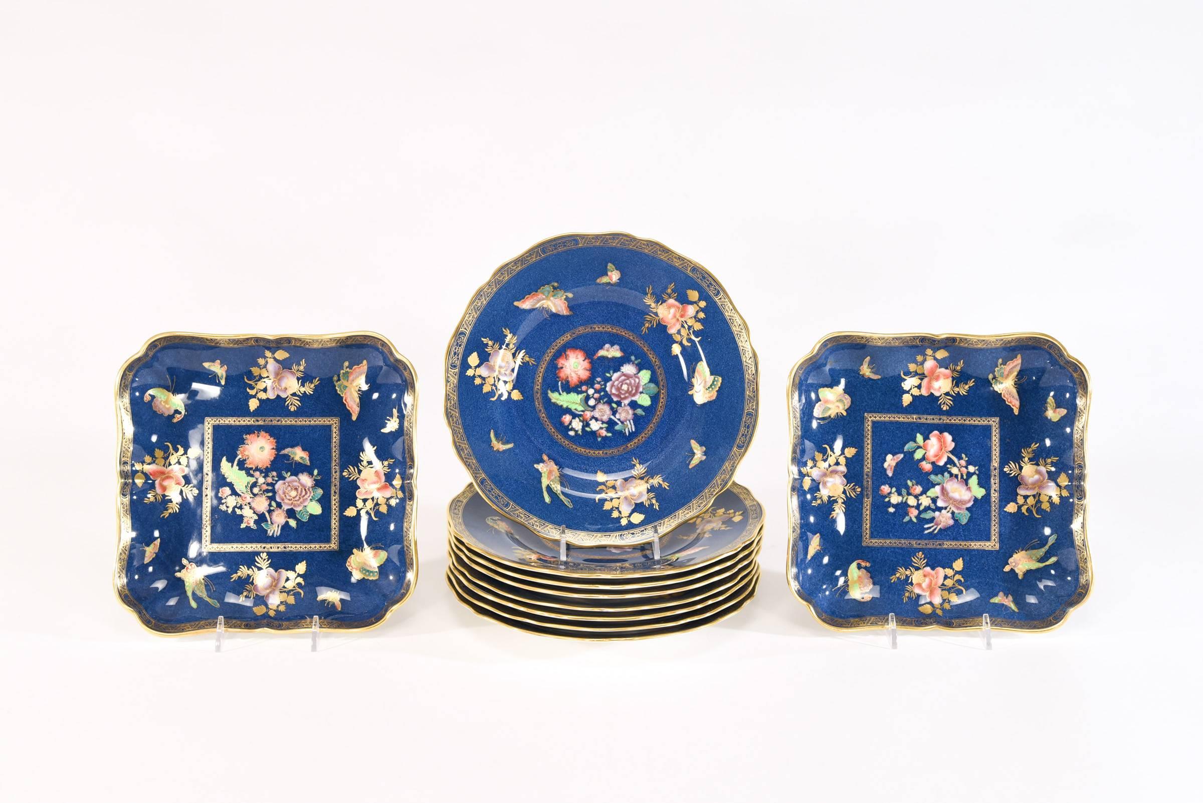 This set of 8 Copeland Spode dessert plates is accompanied by 2 matching square serving plates- Perfect for a cheese and fruit course as well as desserts- The Aesthetic Movement motif features flowers and butterflies, highlighted in gold on a powder
