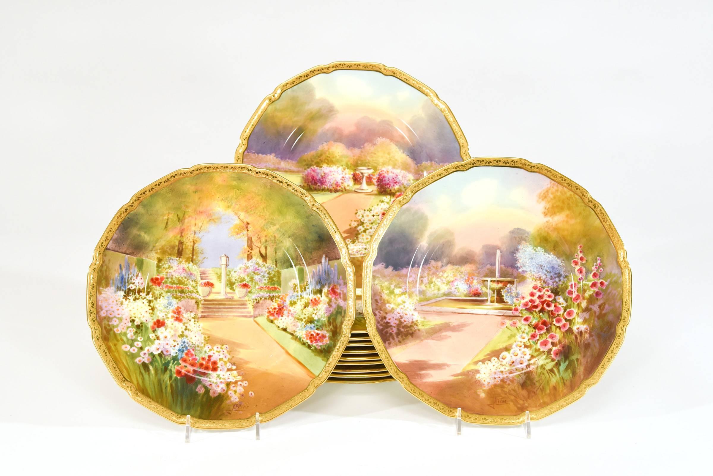 This set of 12 Royal Doulton dinner or cabinet plates is hand-painted with landscape and garden scenes in a bright vibrant palette. Each unique plate has the garden (Dingley Park, Draketown, The Moated Grange, Ammerdown, etc.) named on the reverse