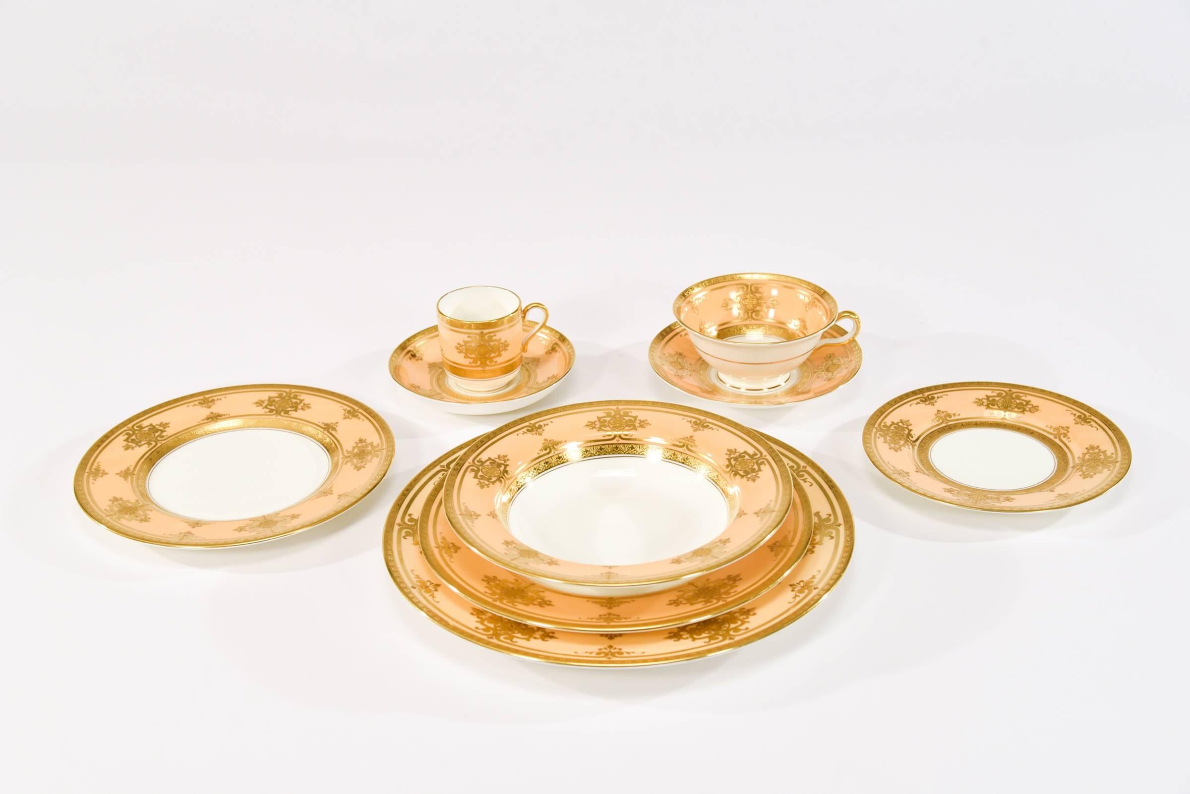 As we approach the holiday season, this complete Minton for Tiffany dinner service for 12 will work with many decorating themes to dress up any event. The warm butterscotch border frames a clean white center and is decorated with an elegant