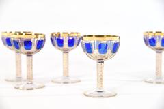 Set of Eight Moser Cobalt Blue and Gold Panel Cut Champagne Coupes