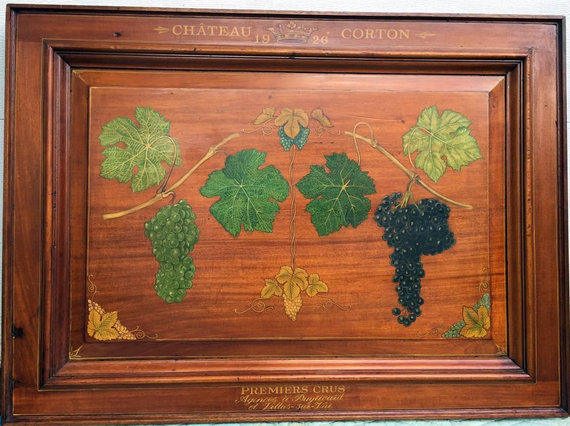 Though this isn’t my usual areas of offerings, I was so excited when I came upon this amazing wine related piece of artwork. Perfect for a wine cellar or restaurant, this large mahogany sign is a true work of art. It is titled Chateau Corton 1926