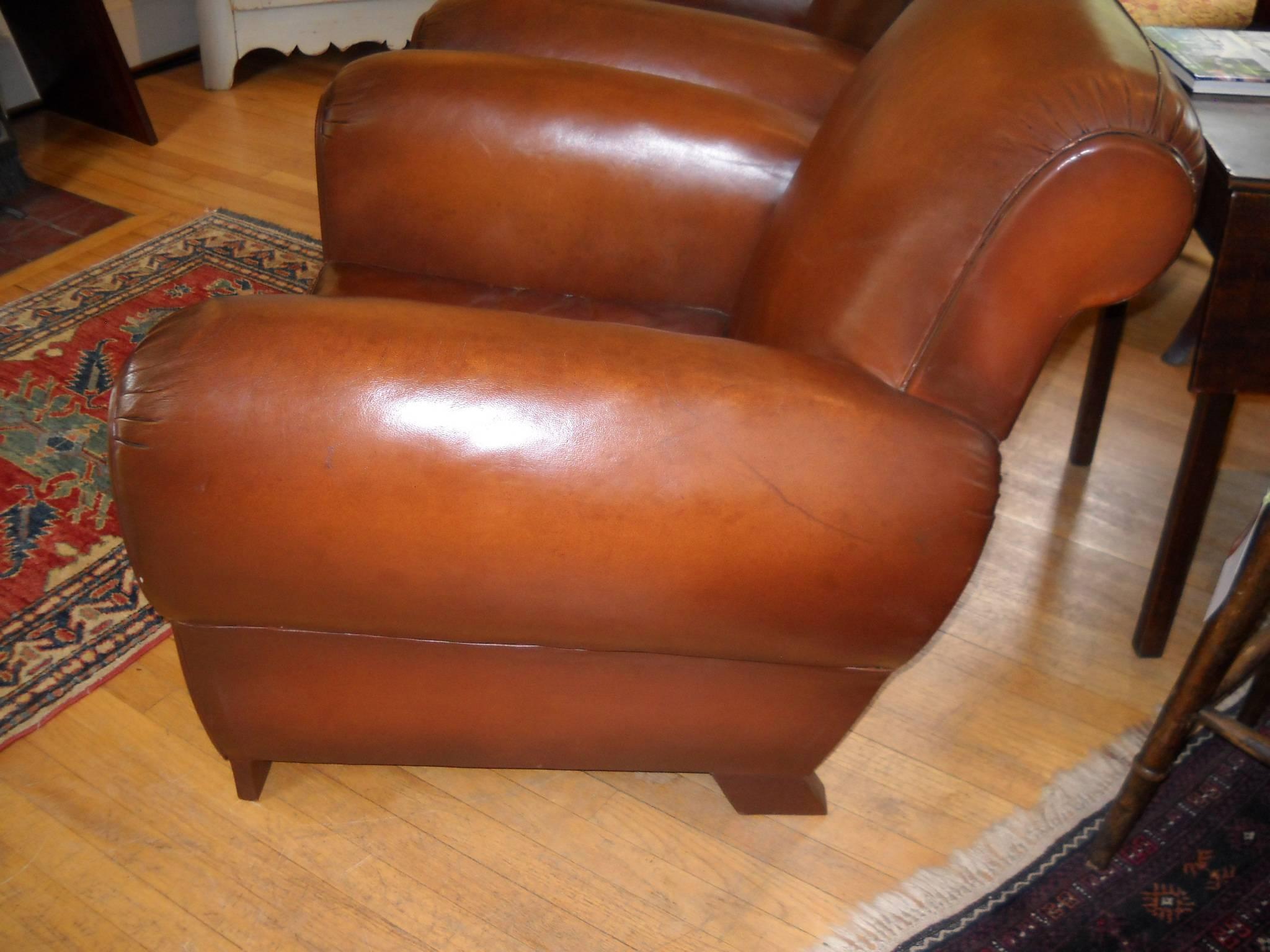 You can’t find leather chairs from France that are in better condition with a warmer color or are more comfortable. They are simply a rich pair of 1930 French leather chairs. No tears, rips or discolor throughout the chairs.