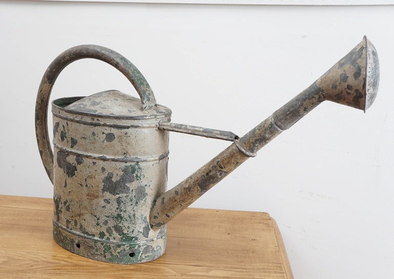 antique french watering can