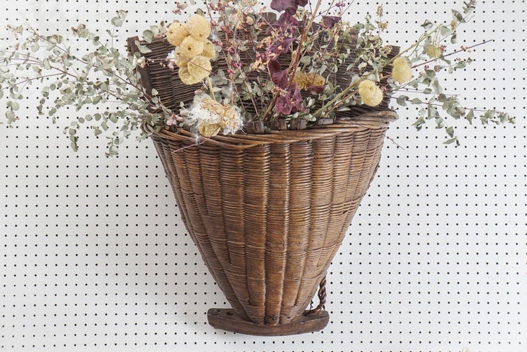 We love grape gathering baskets at painted porch. Used in the south of France and strapped to the workers back to pick grapes. These baskets either came in wicker or metal. They look wonderful on a wall with dried flowers. Take a look at some of the