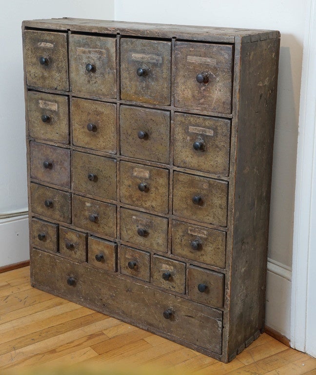 This original painted apothecary still has traces of its labels and is rustic, in a grey/ mustard paint. The unique piece doesn’t stop there. It has original steel knobs and couldn’t be more stunning. We were quite fortunate to acquire this piece.