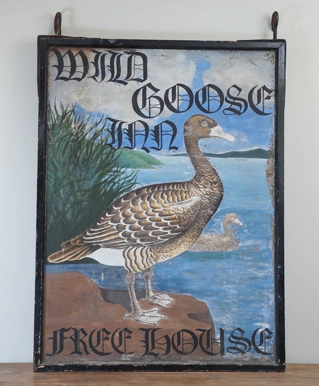 It's been a very long time since we have found a pub sign as original and nice as this one. It reads 