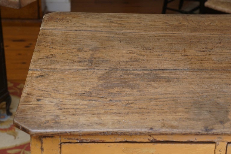 This is one of the most unique pieces we have bought in several years. It has original caramel shade paint and all original hardware. There are drawers on both sides of this one of a kind hardware store counter from the south of France. There is a