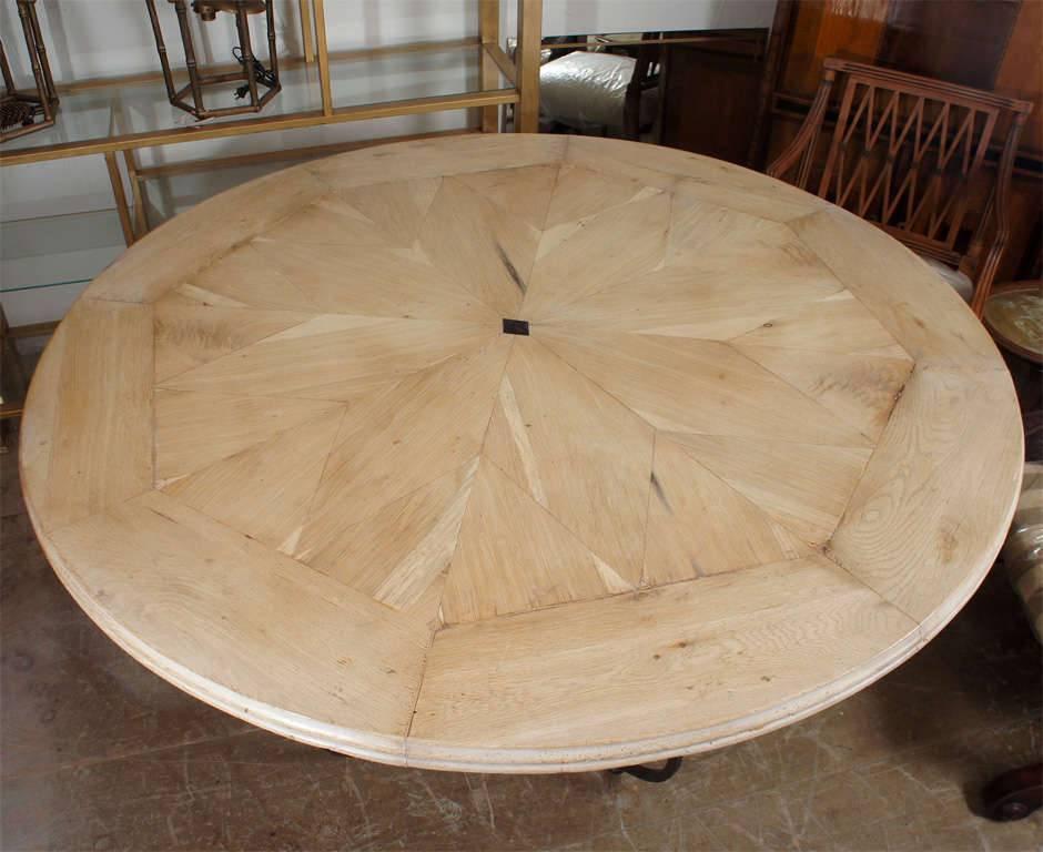 Stunning round bleached oak tabletop with starburst design and French Baroque style metal base dining table. Top and base can be sold separately. See detail photo to appreciate tabletop.
Top 4000/Base 3500.
The widest part at the bottom of the base