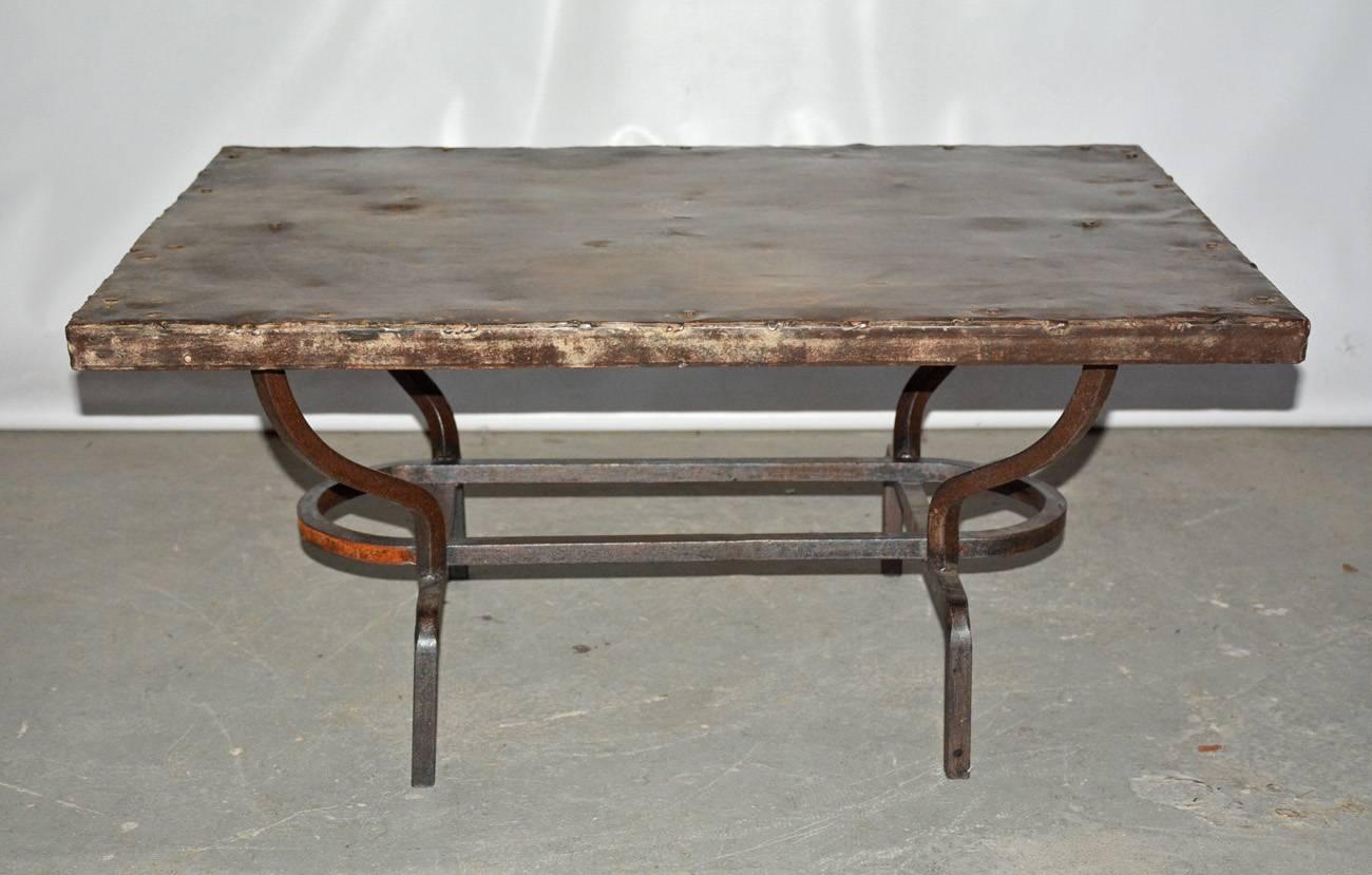 Rustic antique metal top on contemporary cast iron metal base coffee table. Wonderful patina. 
Great to use indoor or outdoor on porch patio or garden.

Top: Depth 26