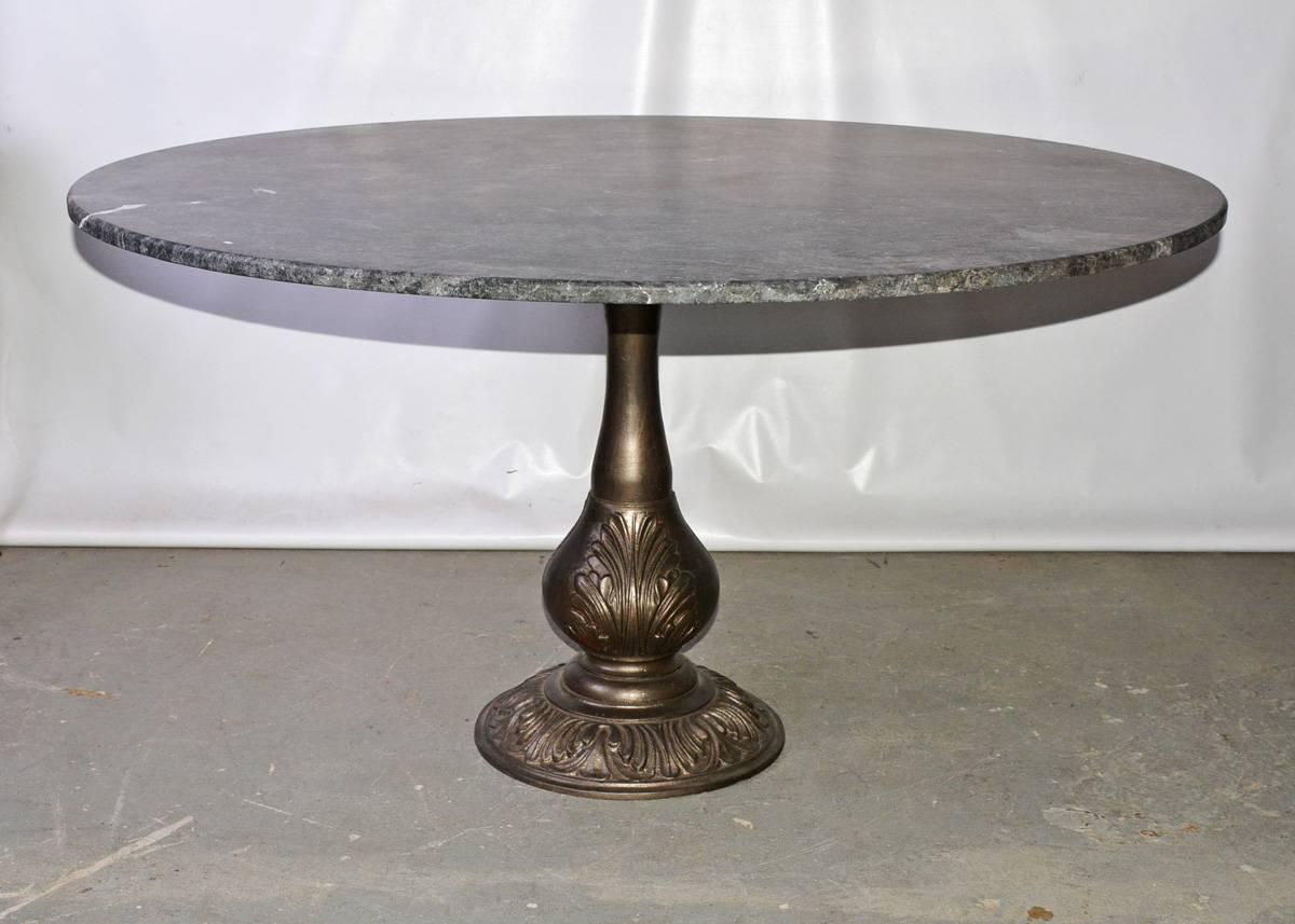 This listing is for the base only.  The contemporary indoor or outdoor pedestal can be used in combination with a stone, glass or wood top for dining or conference table.  The 19th century cast iron pedestal base in its natural silvered color. The