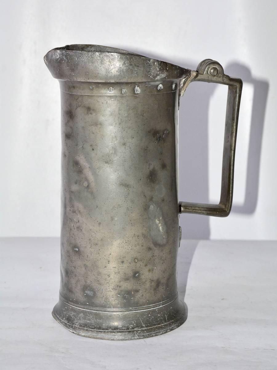 19th century English pewter culinary piece for measuring. Measure marks on the upper rim of the piece.