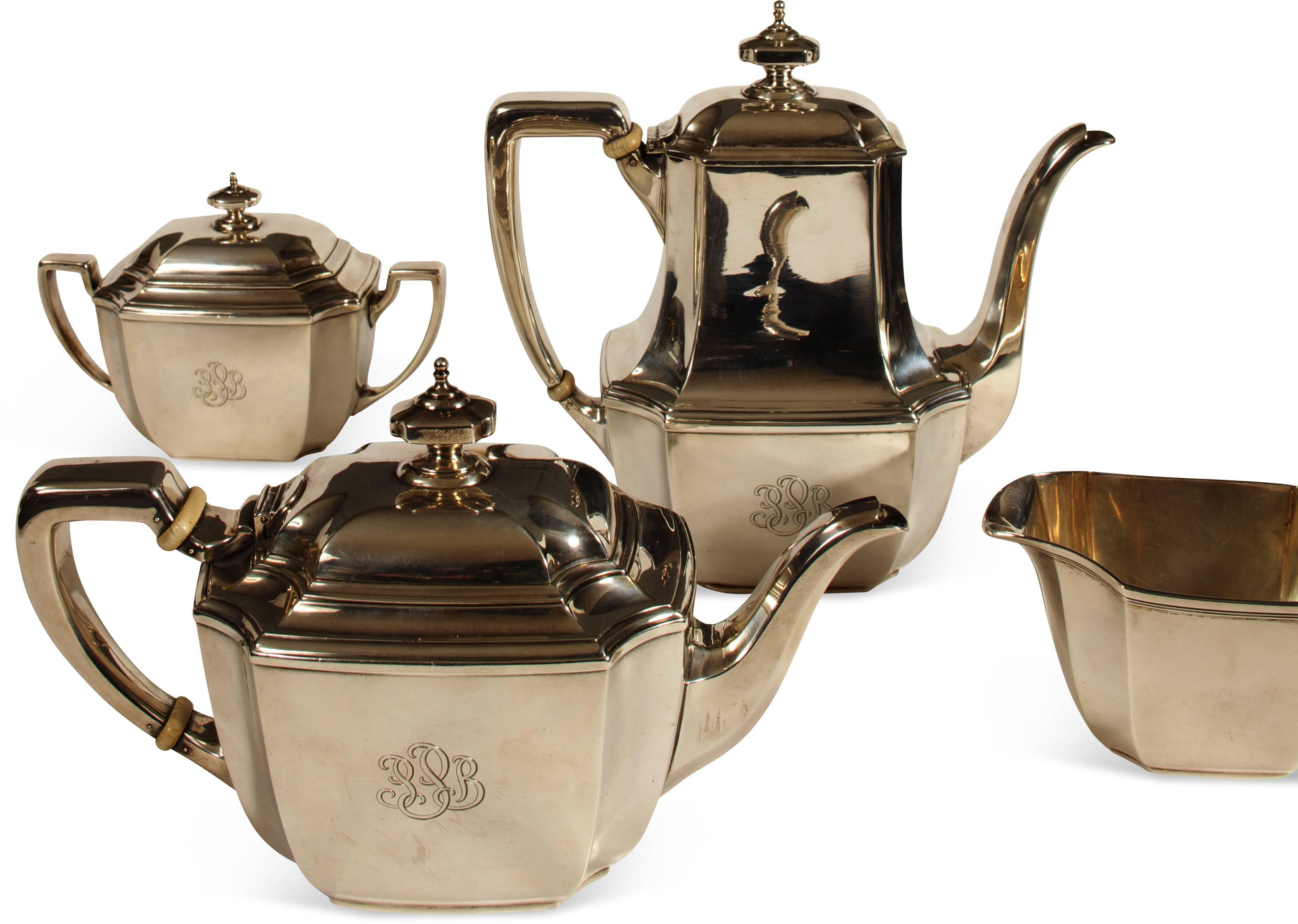 Tiffany & company four-piece sterling silver coffee and tea set, circa 1940. Comprised of coffee pot, tea pot, sugar and creamer, all with faceted corners and monogrammed 'PPB', all marked '18389' below. 66.6 T.O.
Price quoted is for the entire set