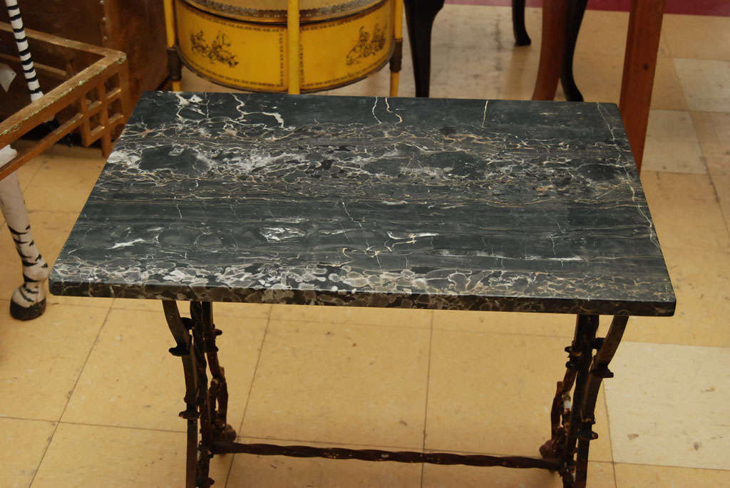French marble-top on lyre style metal base side table or end table with wonderful patina.