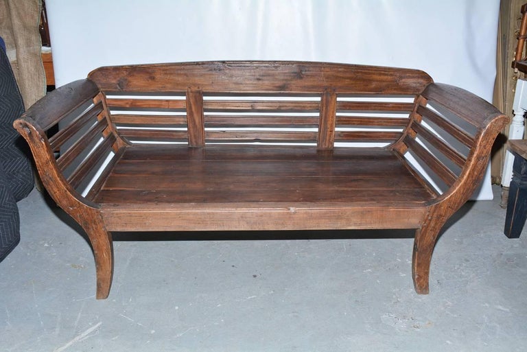 Antique Teak Settee with Slatted Back, Arms and Cushion For Sale at 1stdibs