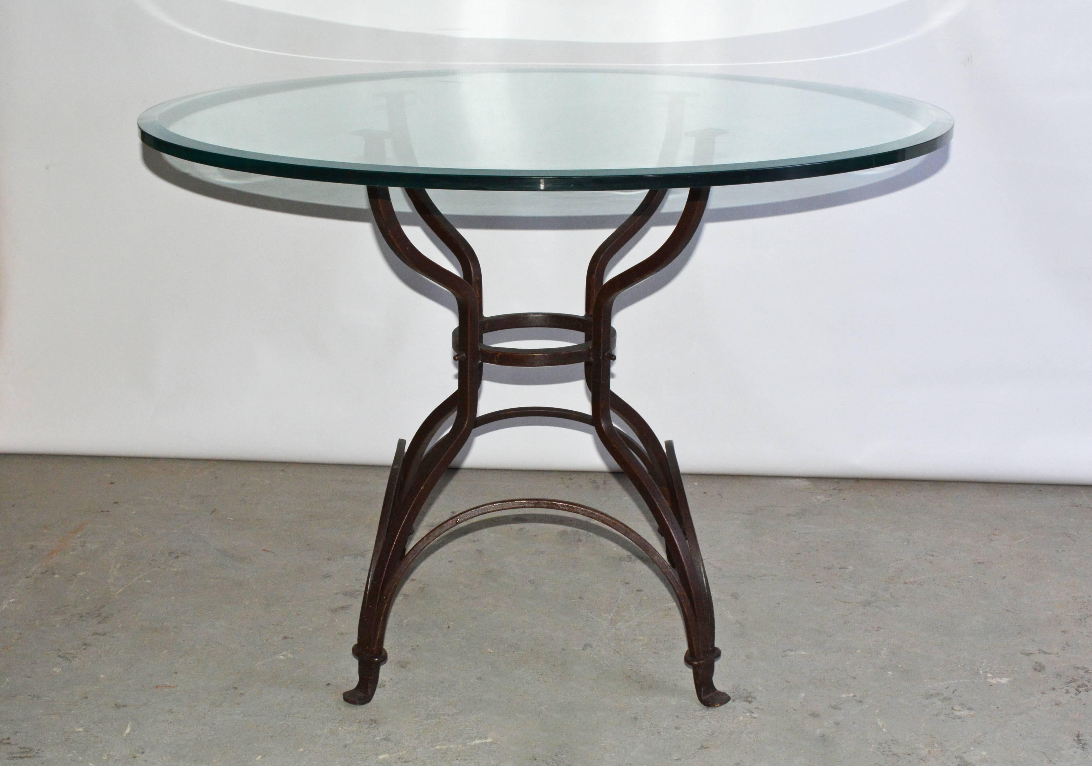 Indoor or outdoor iron metal base and glass top pedestal dining or breakfast table. Top and base can be sold separately. Top 300, base $1300
Base can support stone, glass or wood.
Base dimensions: 24 x 24 at the top, 28 x 28 at the bottom, 29