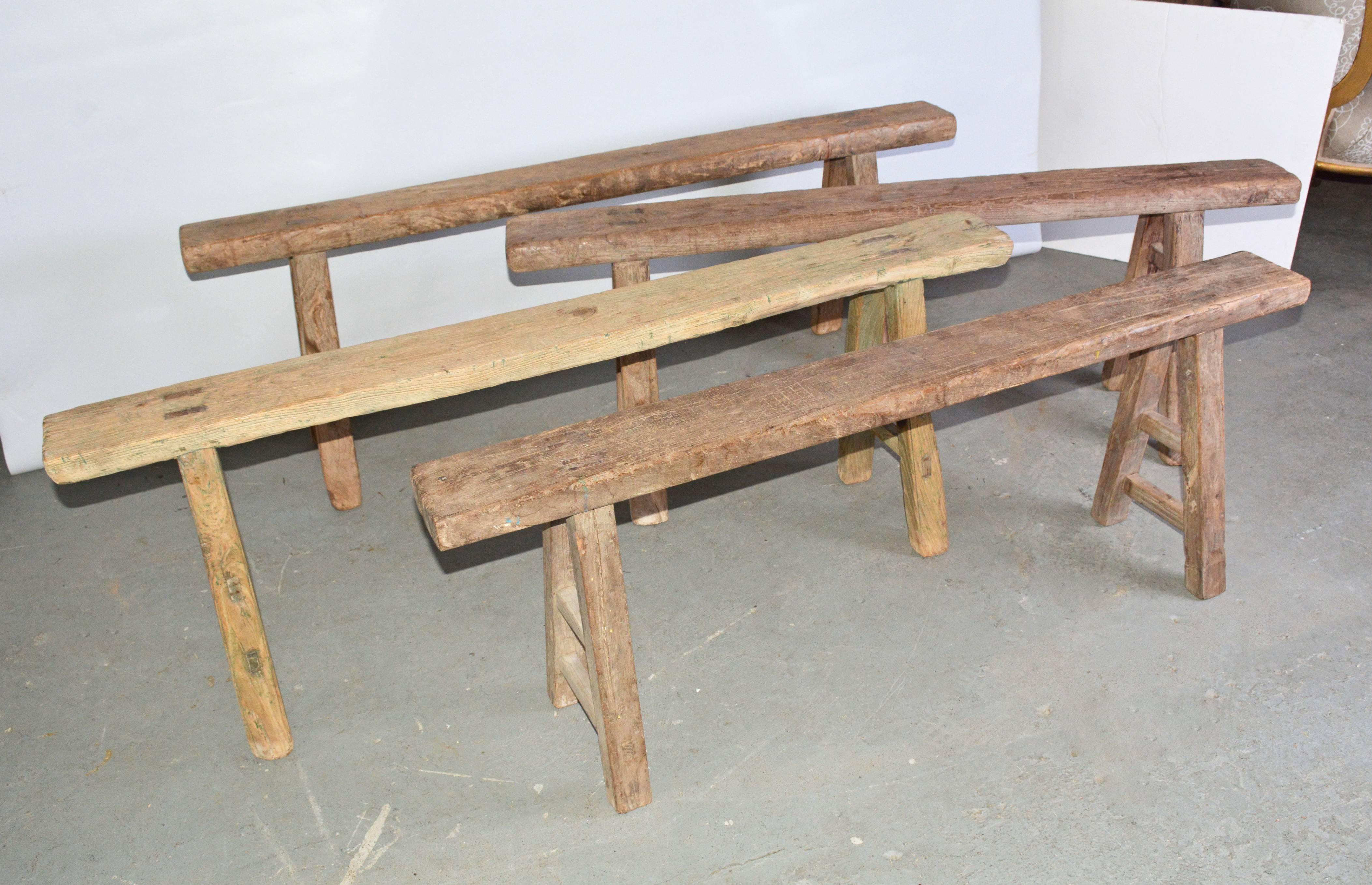 The four antique Chinese benches have splayed legs pegged into each seat. The legs are secured with double stretchers also pegged. Each slightly different. Can be used as dining seating or porch or picnic casual dining.
Bench #1:   seat area -- 54 x