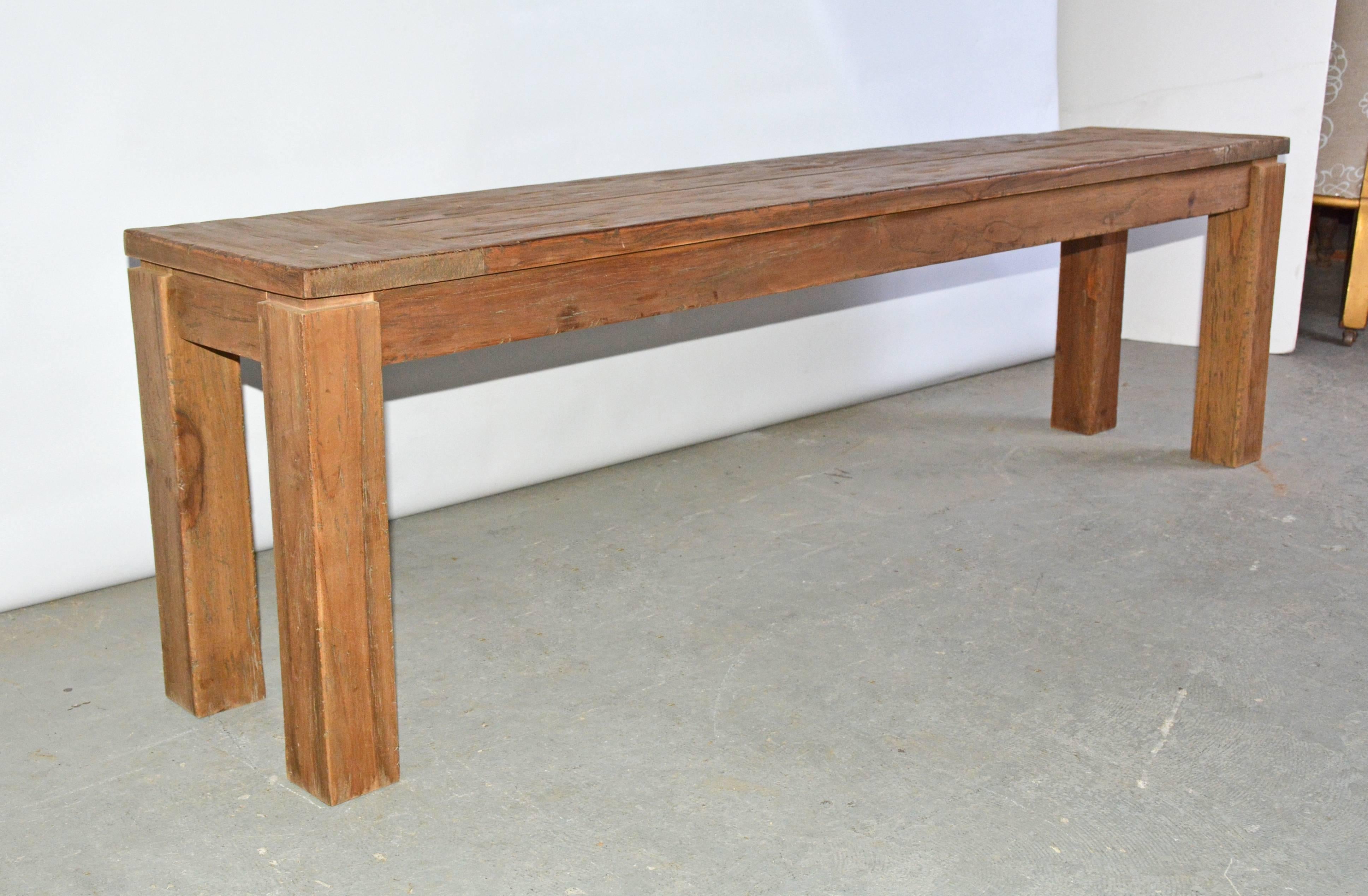 The rustic indoor or outdoor bench has chunky four-square legs and a breadboard top. Great for seating or coffee table. Use on porch, in garden or patio.
Search:  dutch colonial teak wood bench.