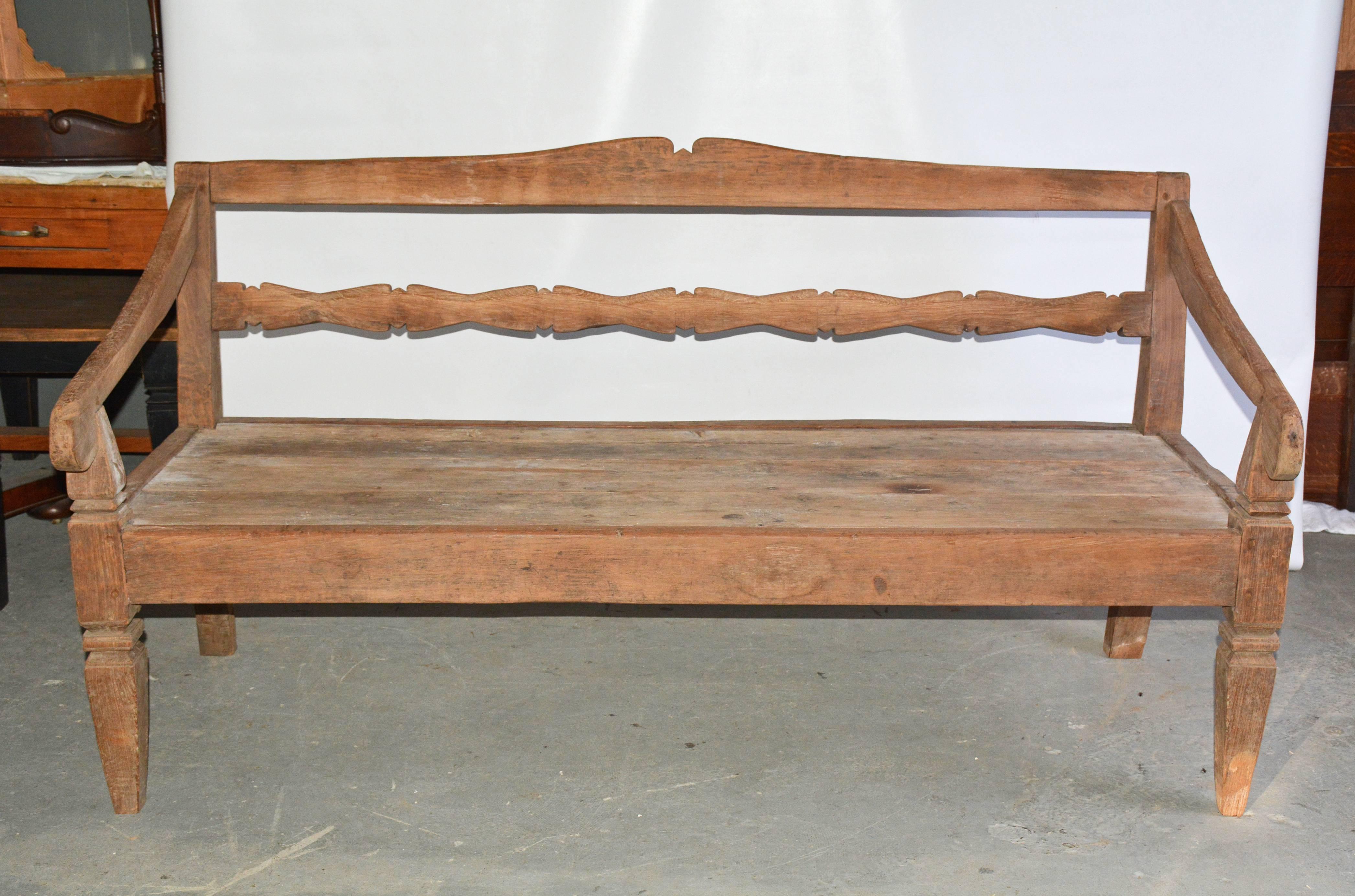 Rustic indoor or outdoor teakwood garden sofa or settee has hand-carved details on the front legs, arms and back. The planked seat is wide and long enough to be turned into a daybed with appropriate padding. Great in garden or on patio.
Search