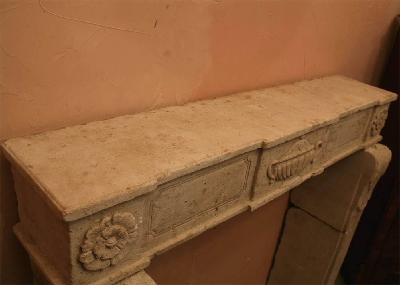 Carved 18th Century French Limestone Fire Surround For Sale